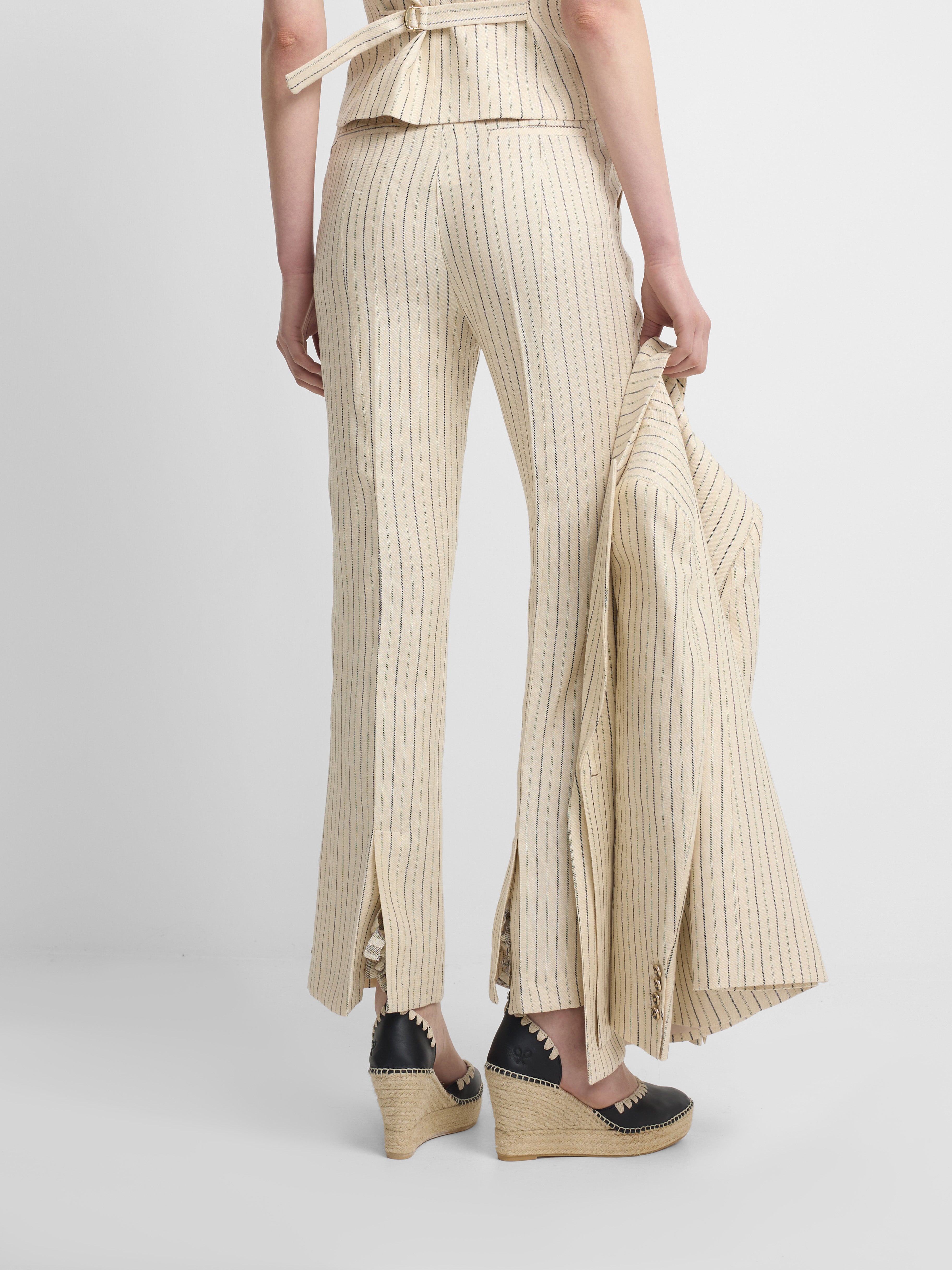 Pantalon crudo rayas azules