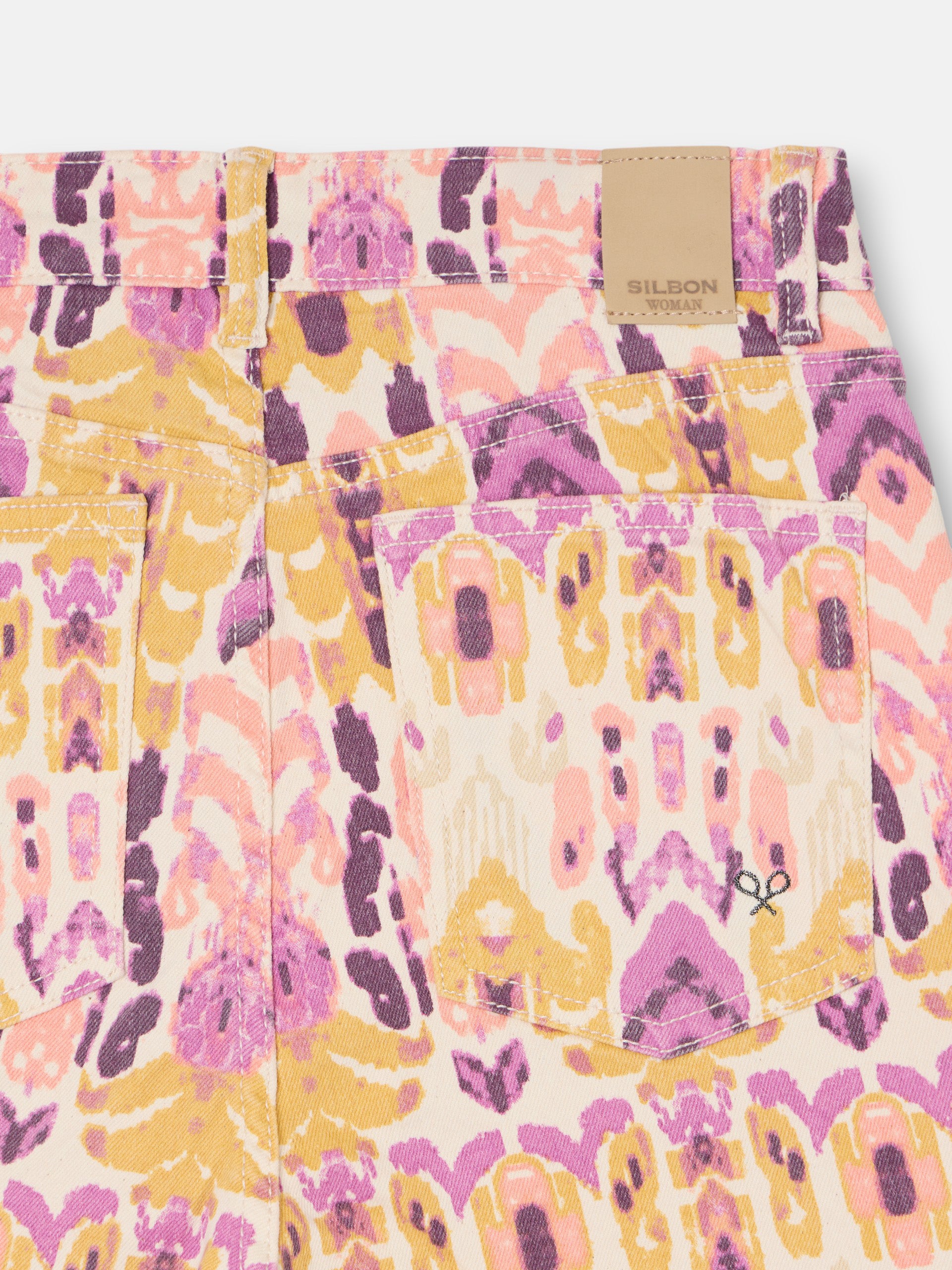 Pantalon denim estampado ikat rosas