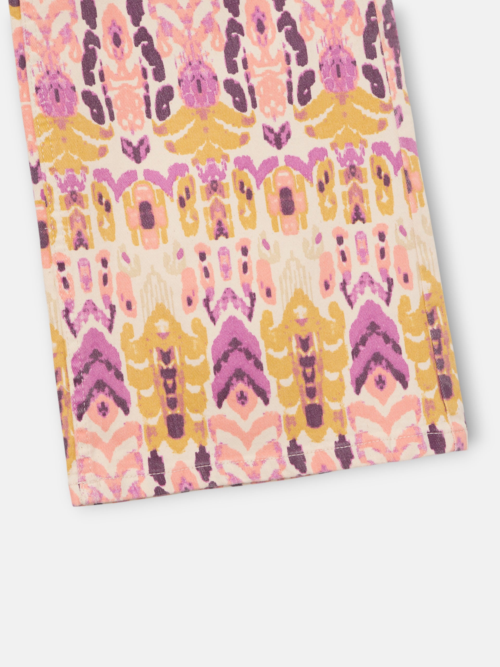 Pantalon denim estampado ikat rosas