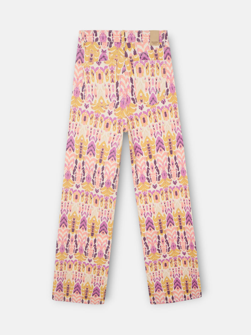 Pantalon denim estampado ikat rosas