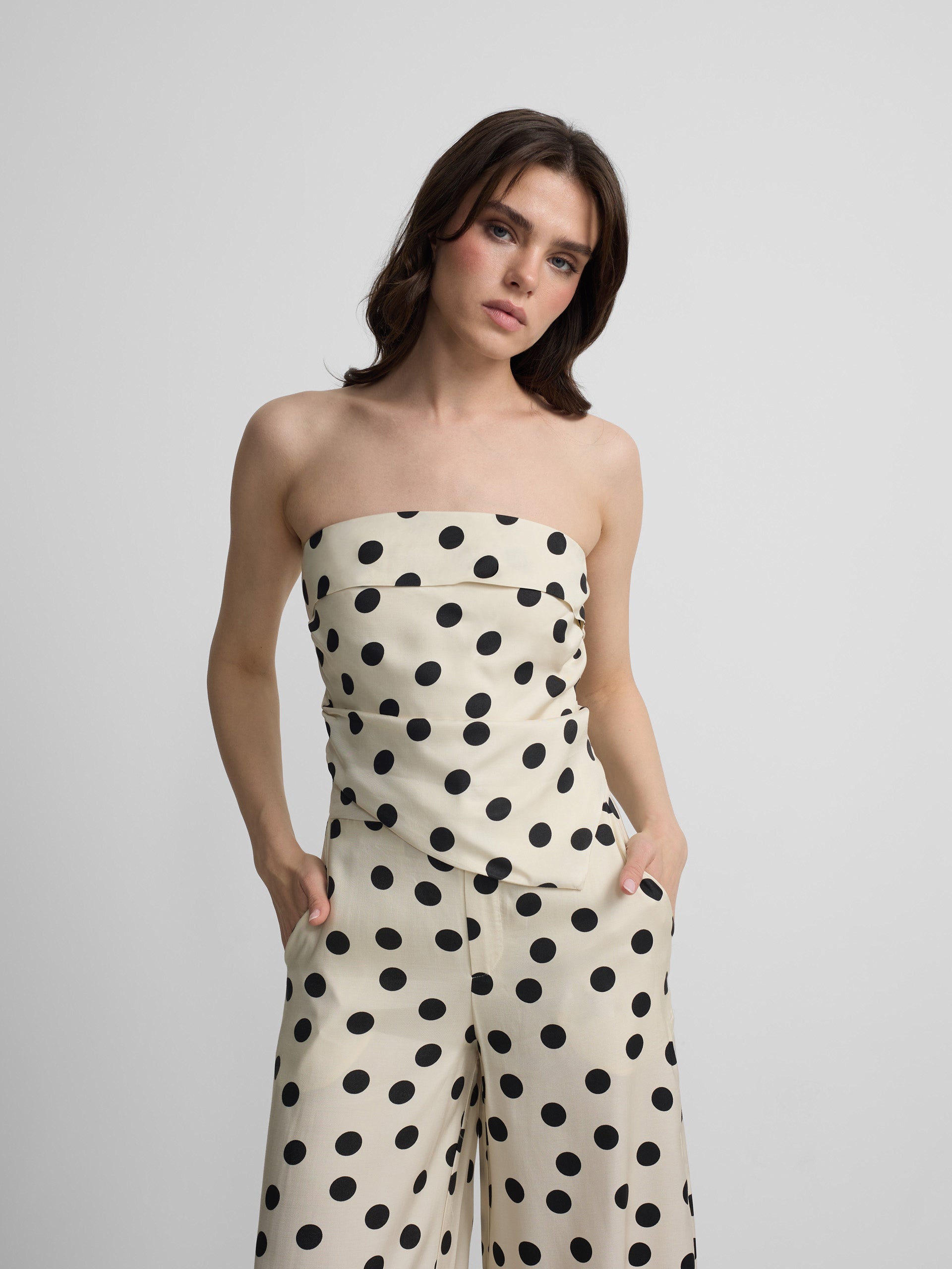 White and black polka dot strapless top