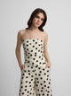 White and black polka dot strapless top