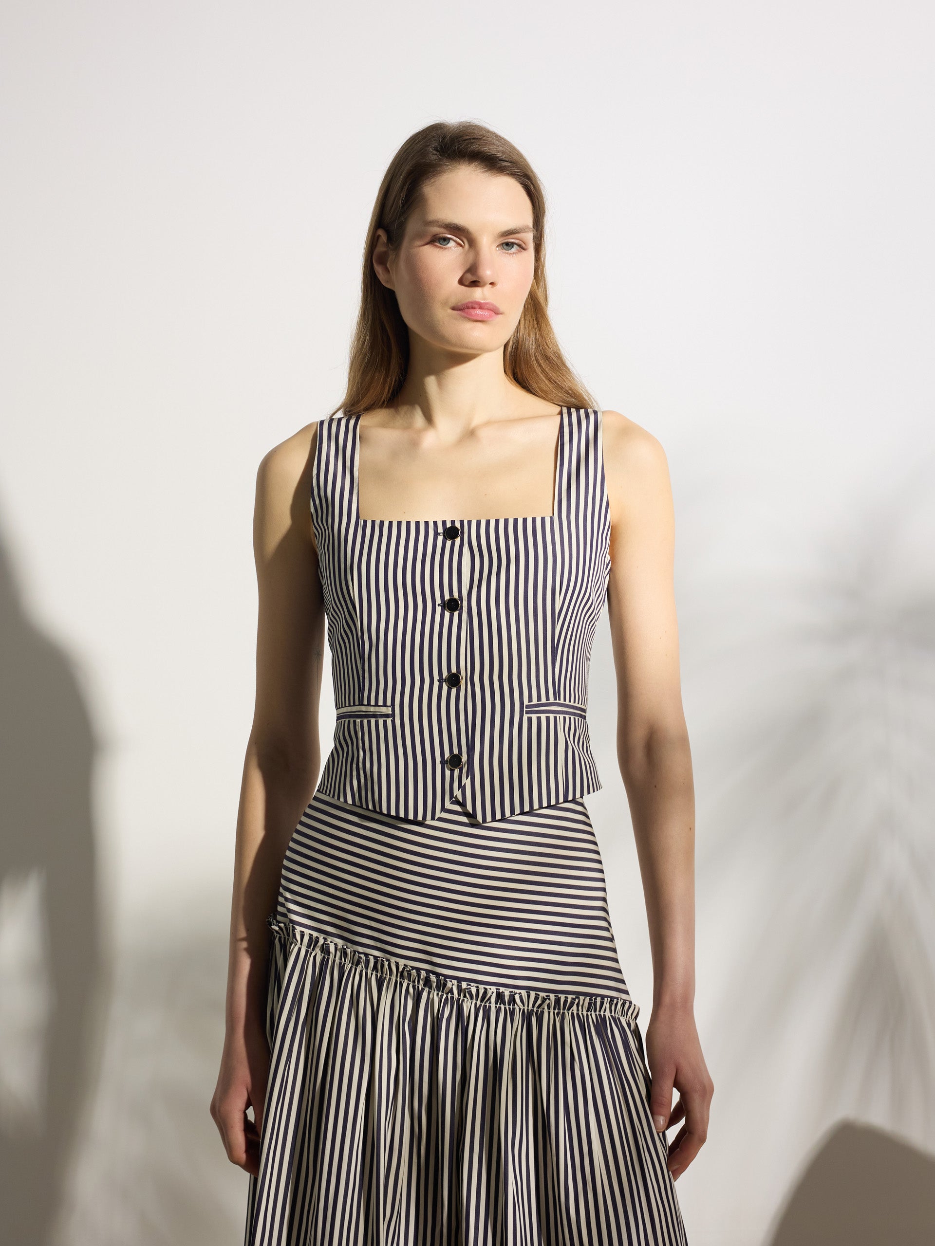 Chaleco unique rayas azul marino y blanco