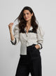 White shirt with combined stripes and polka dots print