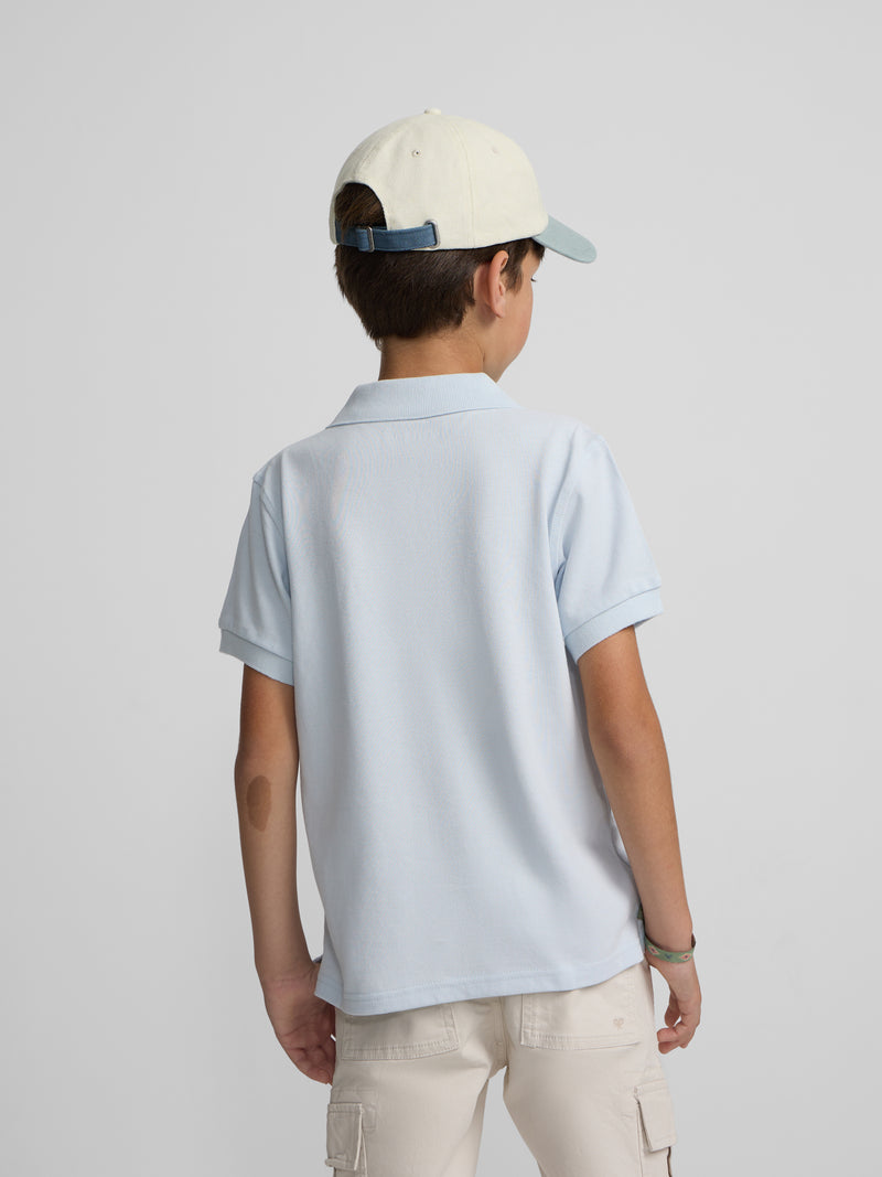 Polo criança liso com logótipo em felpo azul claro