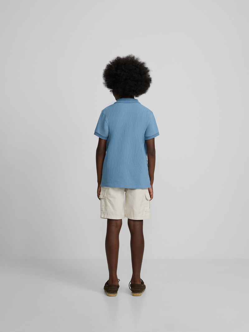 Polo criança liso com logótipo em felpo azul médio