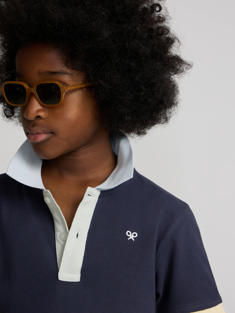 Polo criança com debrum multicolor azul-marinho