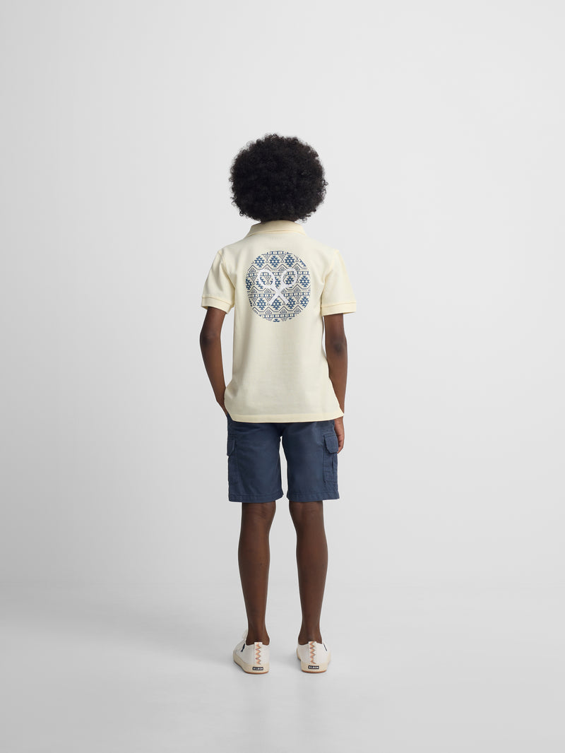 Polo kids raqueta etnica amarillo