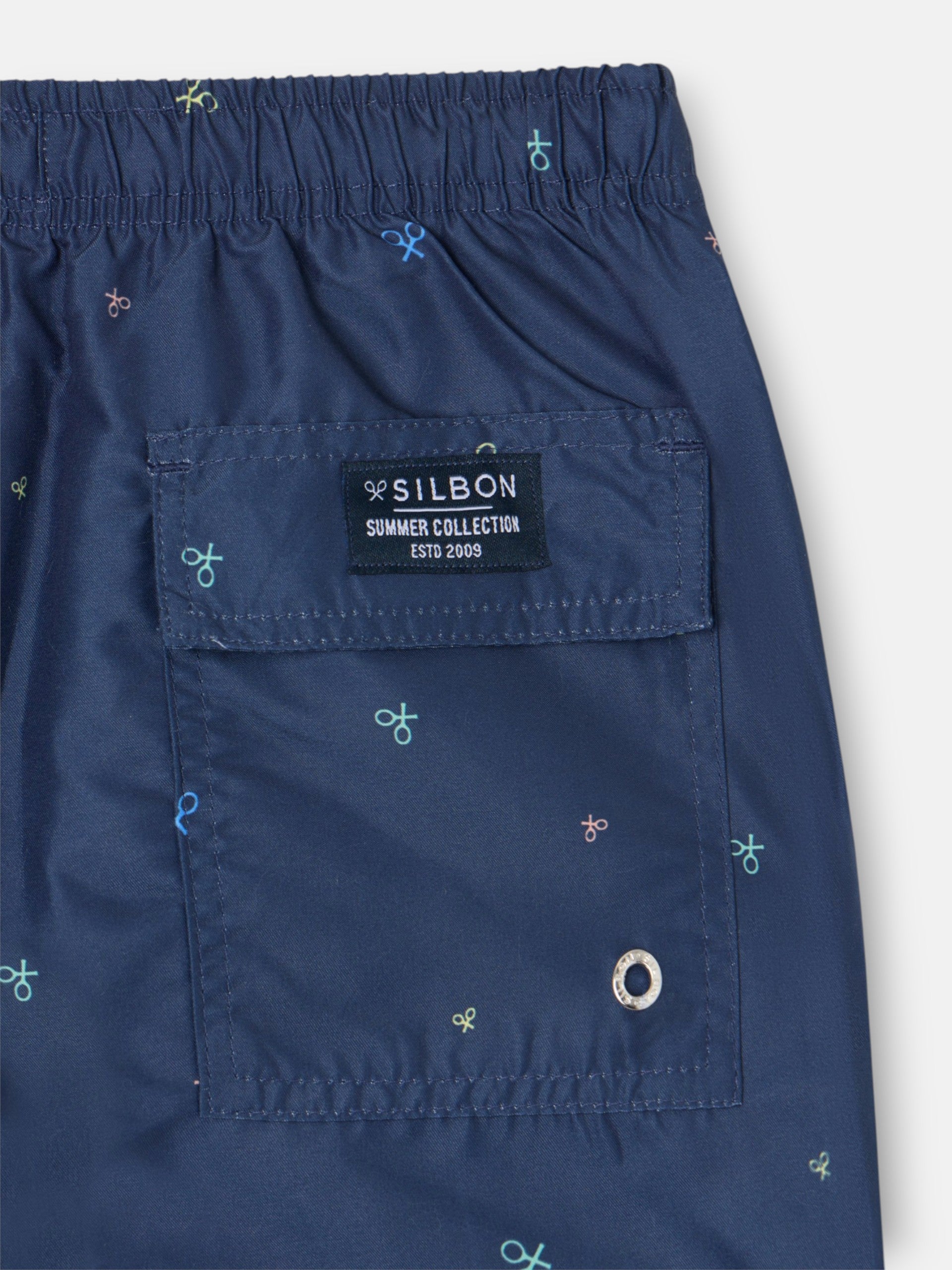 Kids swimsuit with multirackets in navy blue colors
