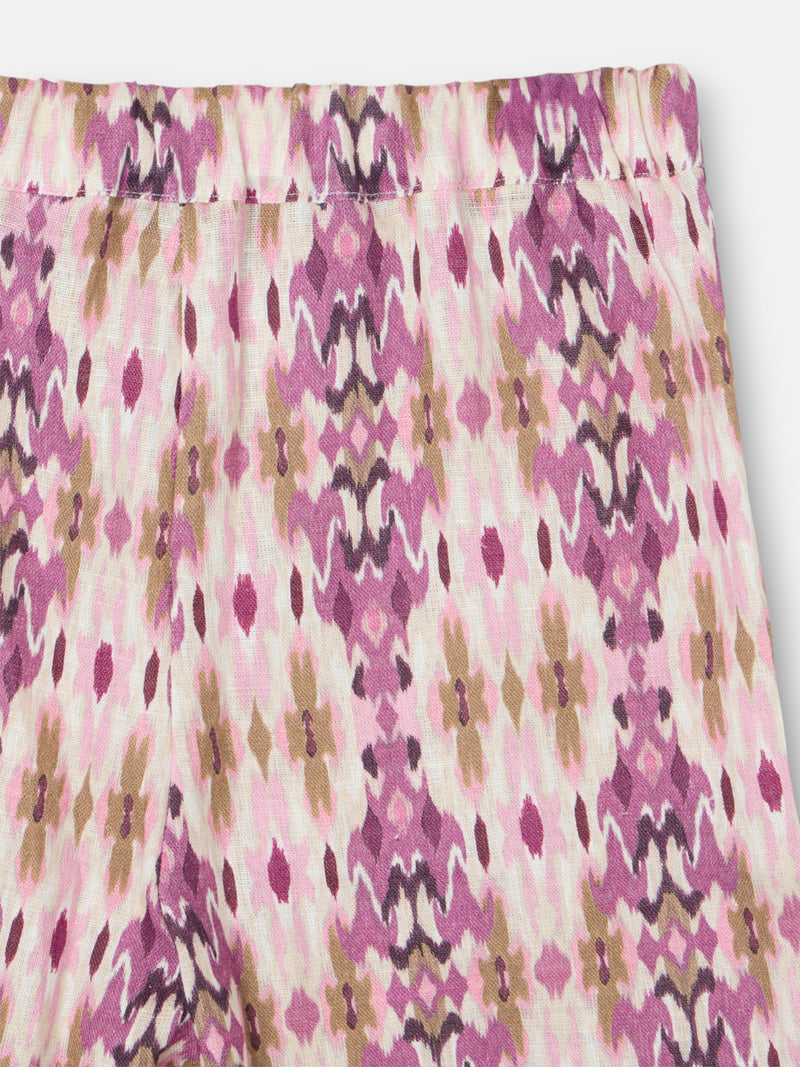Calças de menina em linho estampado ikat rosas