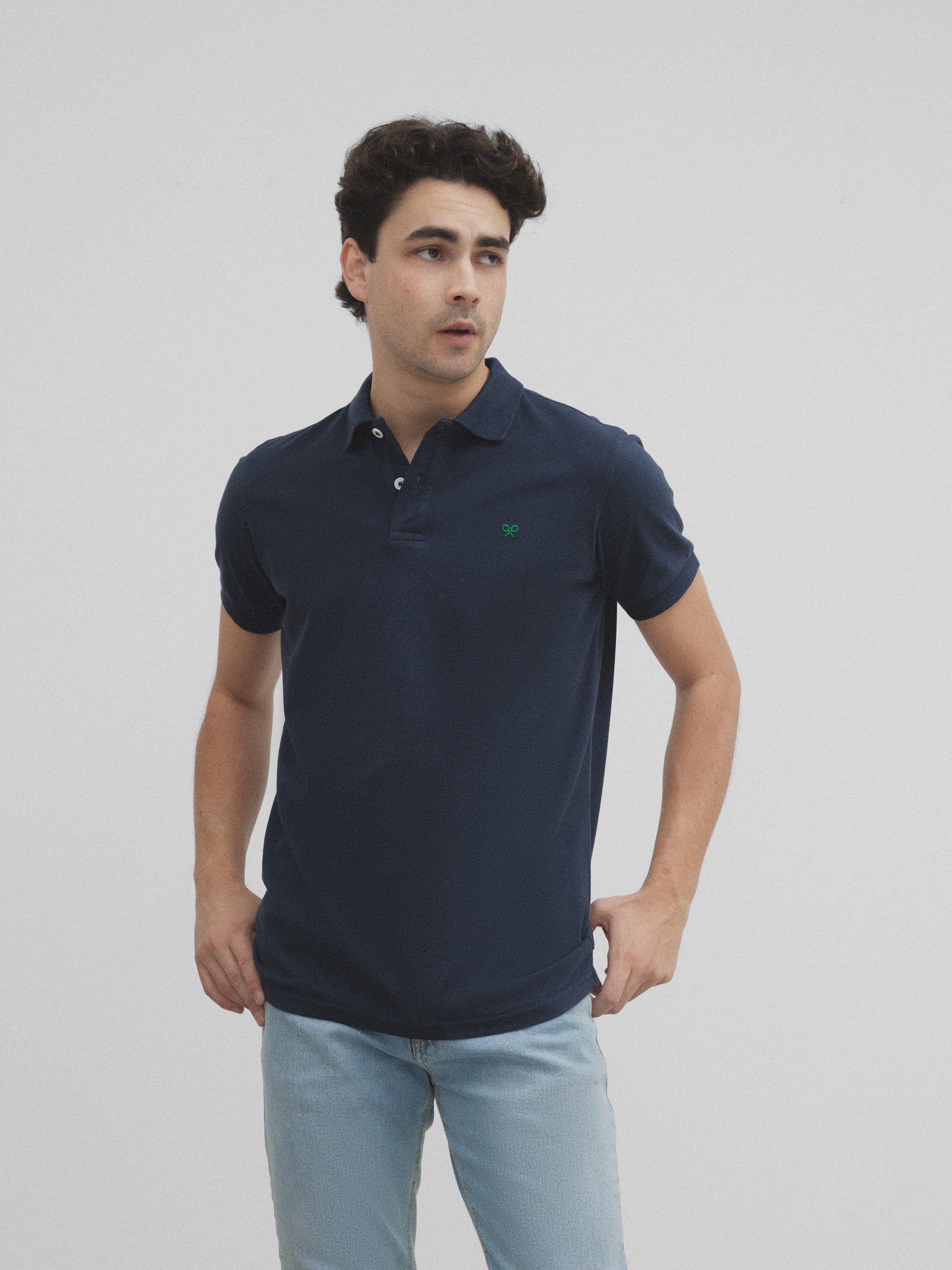 Navy blue green and white racket polo