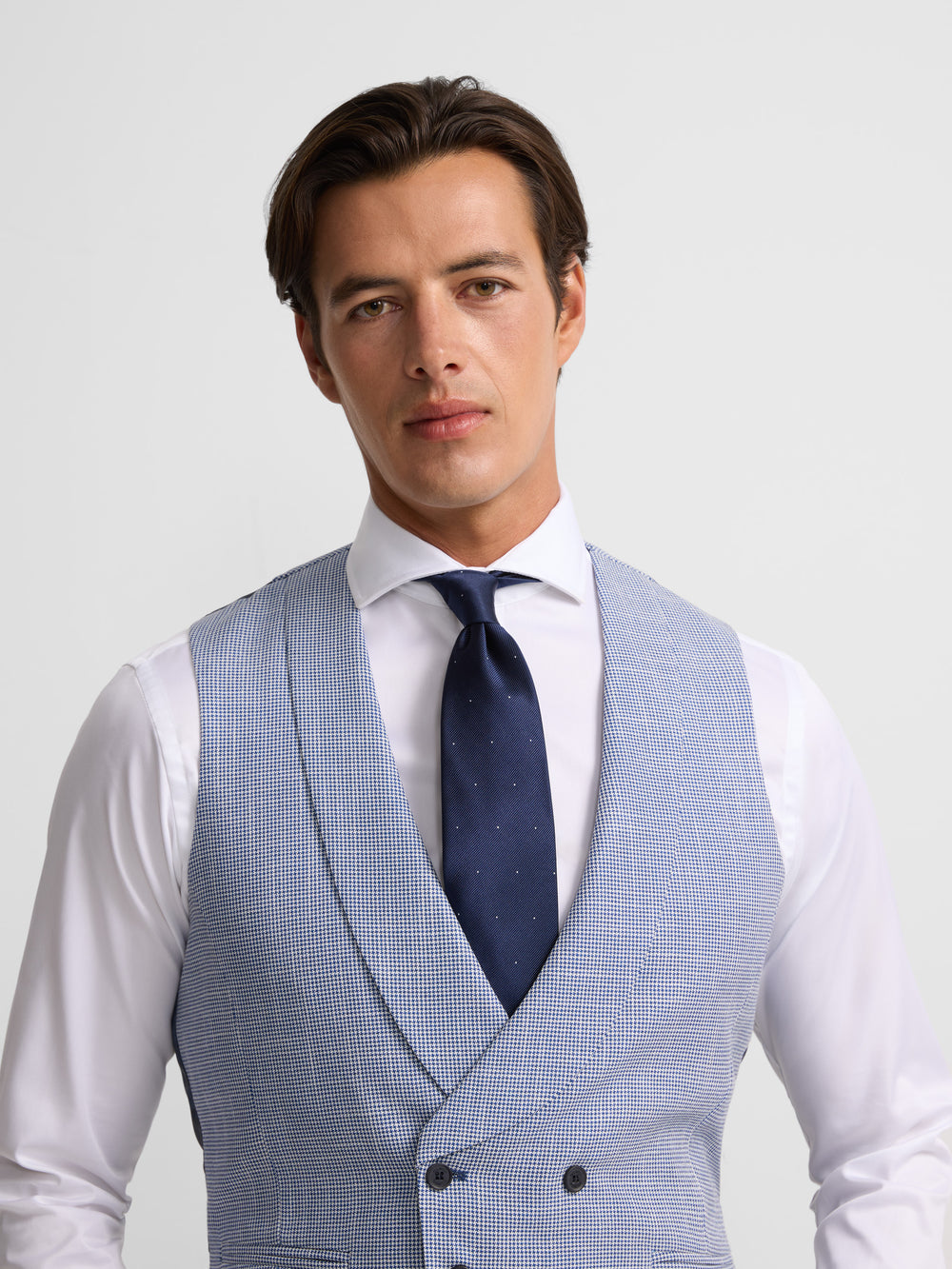 Chaleco chaque cuello redondo pata de gallo azul