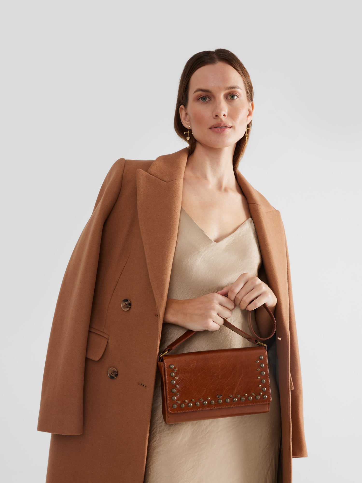 Brown leather studded bag