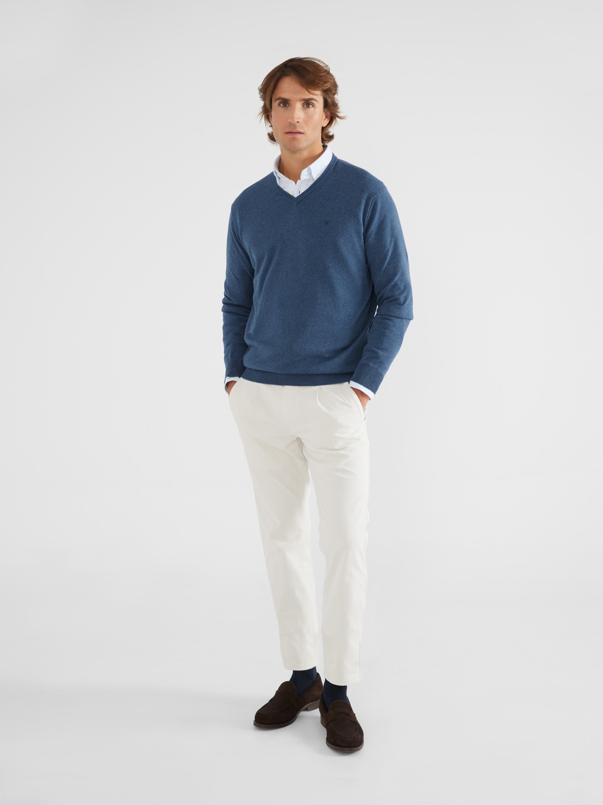 Plain blue V-neck sweater