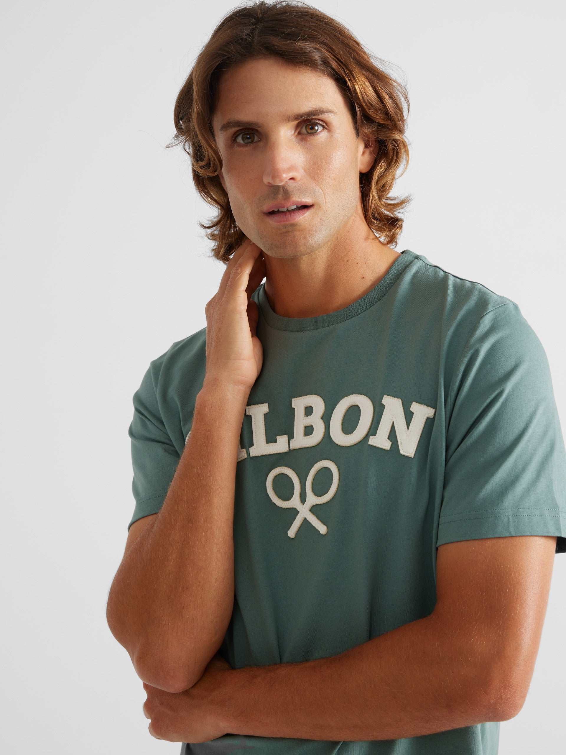 Camiseta logo raqueta media verde