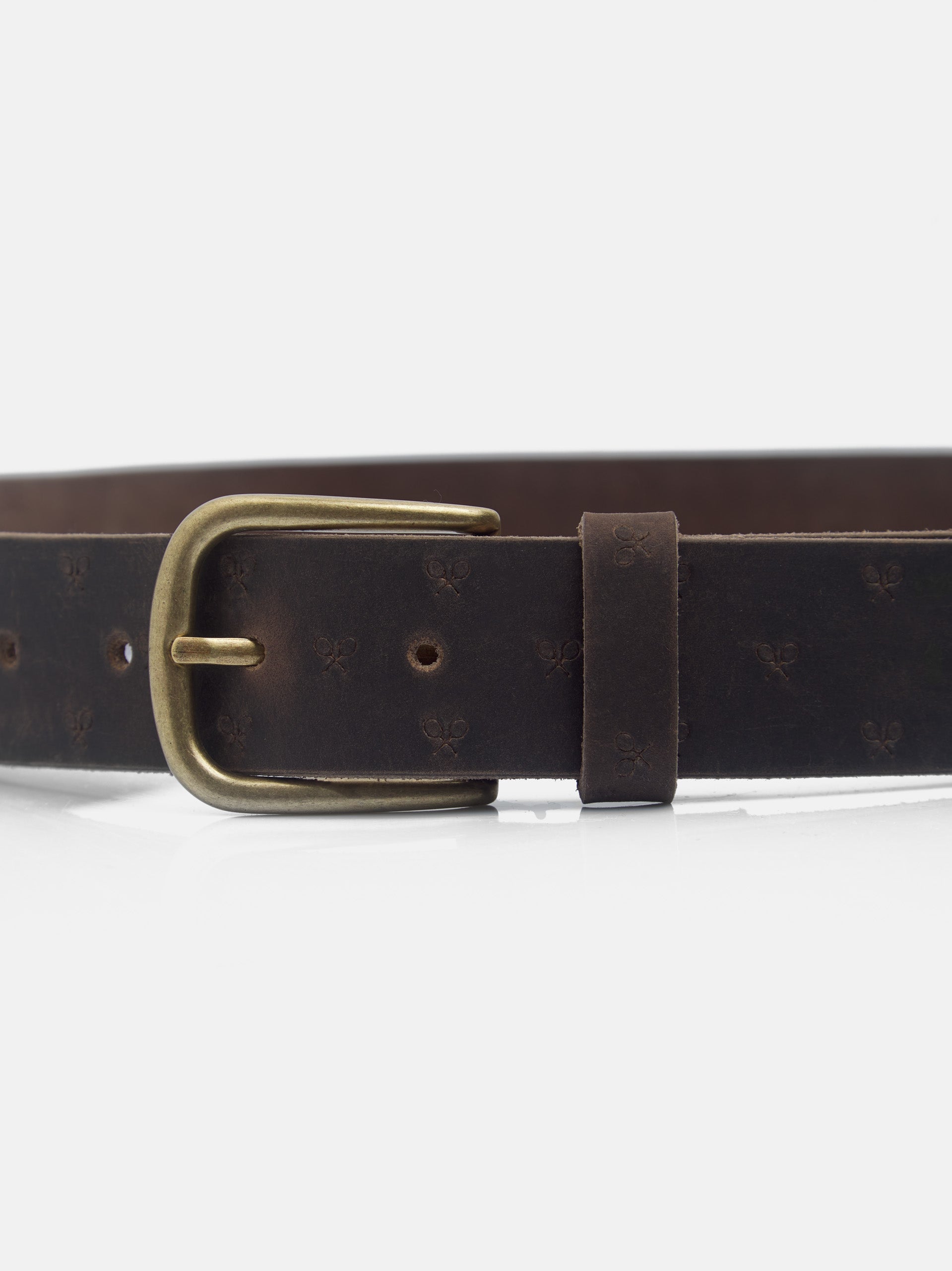 Leather belt engraved with rackets