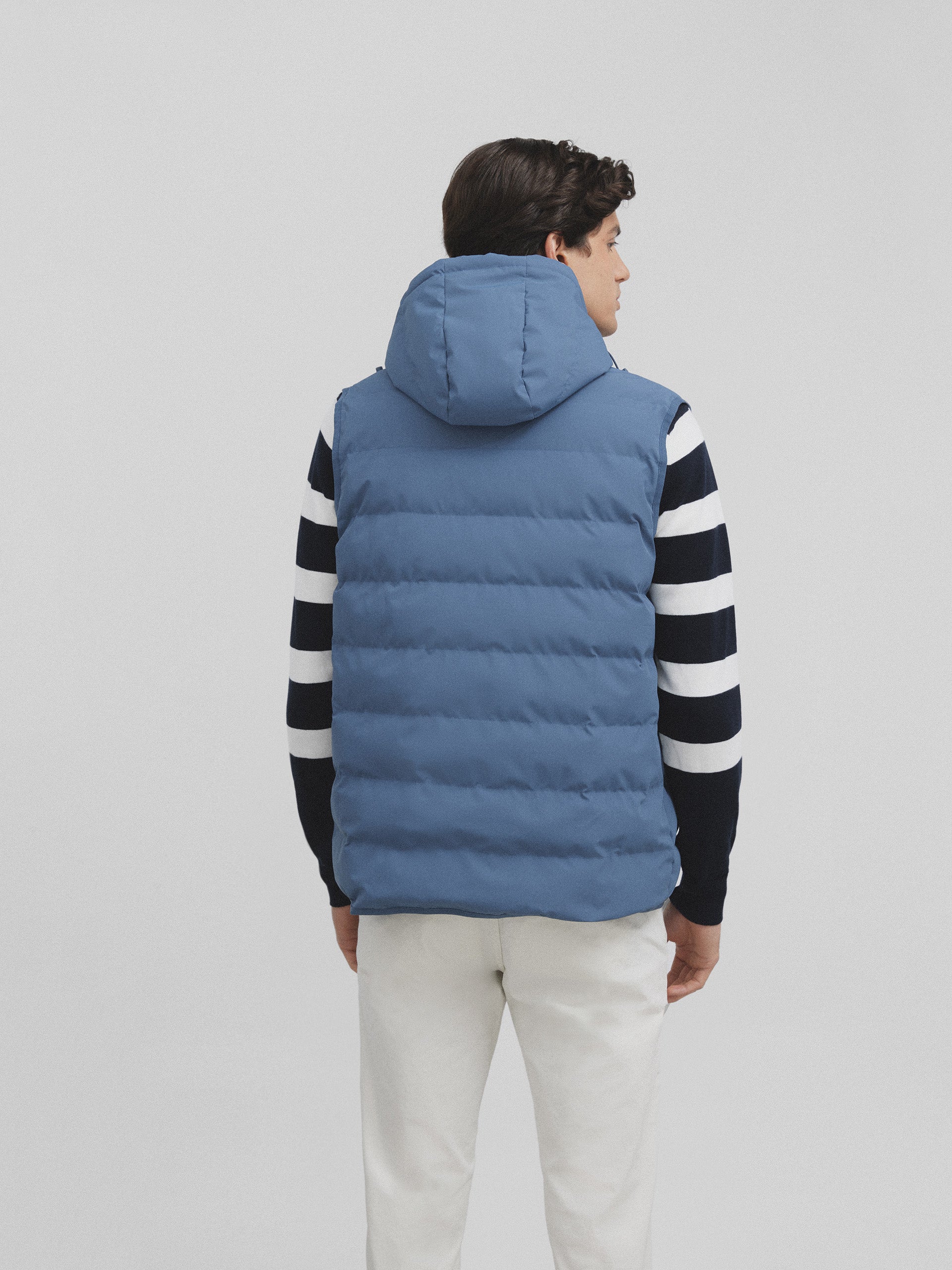 Blue hooded padded vest