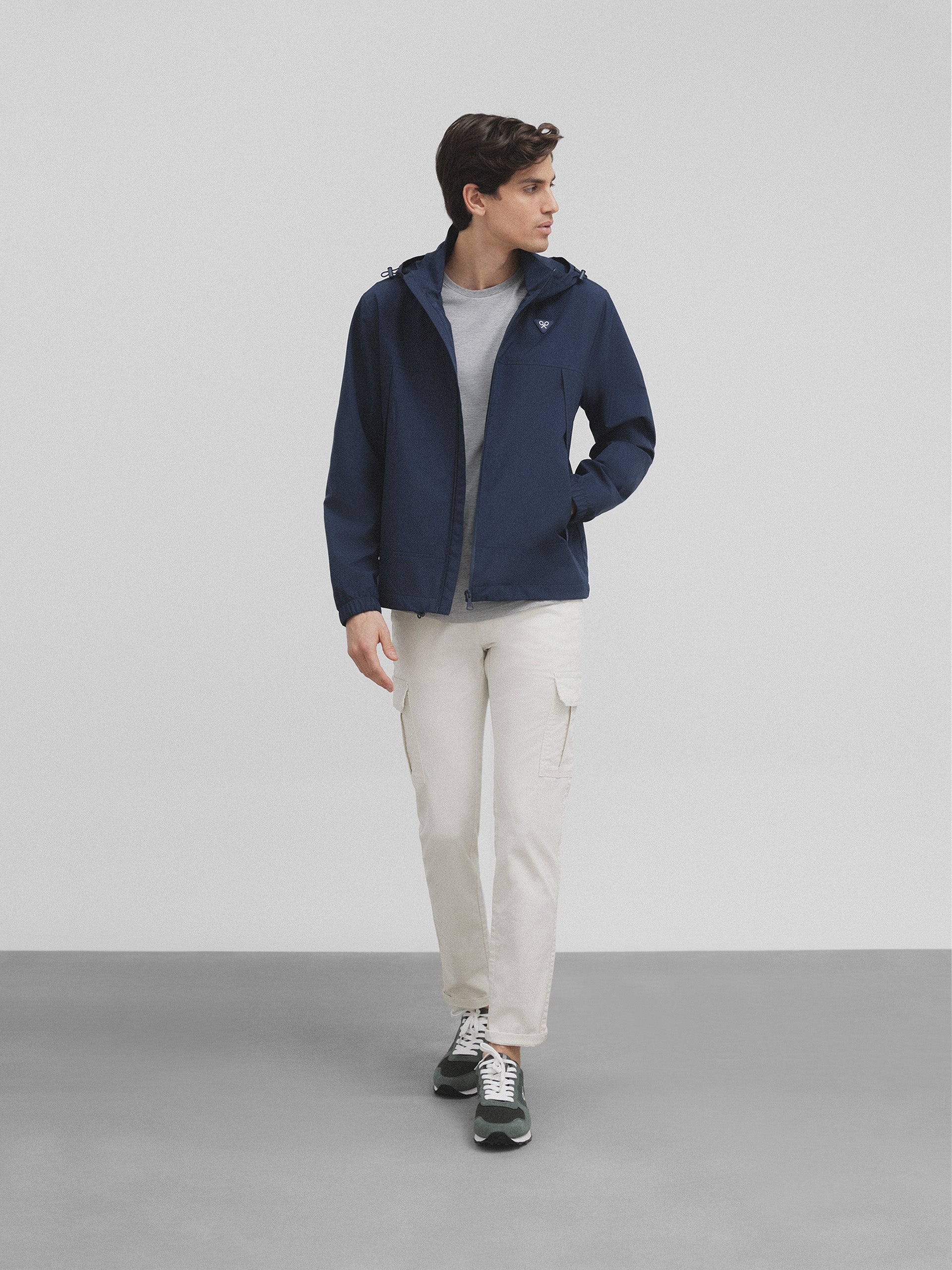 Blue hooded windbreaker jacket