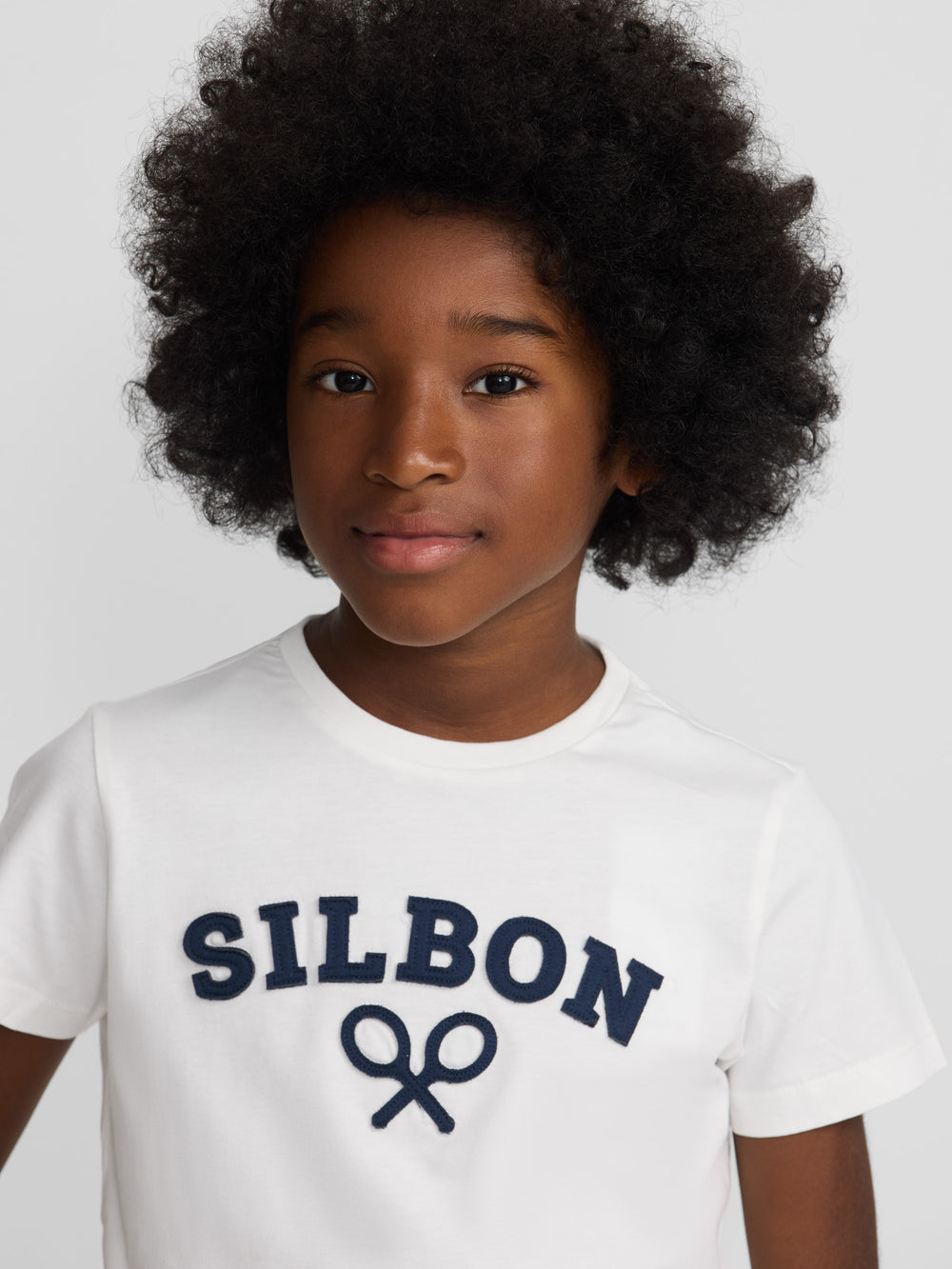 Camiseta kids raqueta media blanca