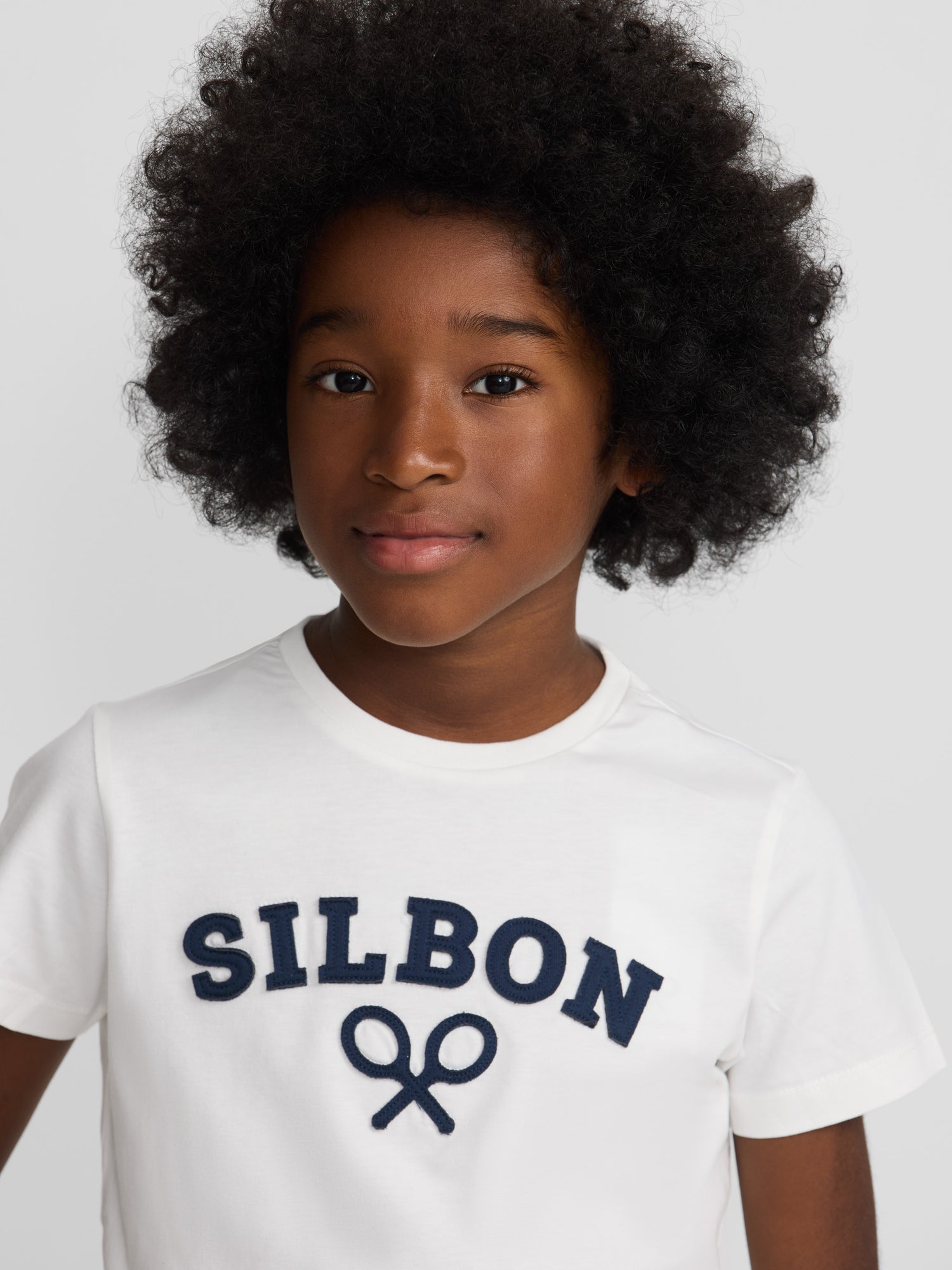 Camiseta kids raqueta media blanca