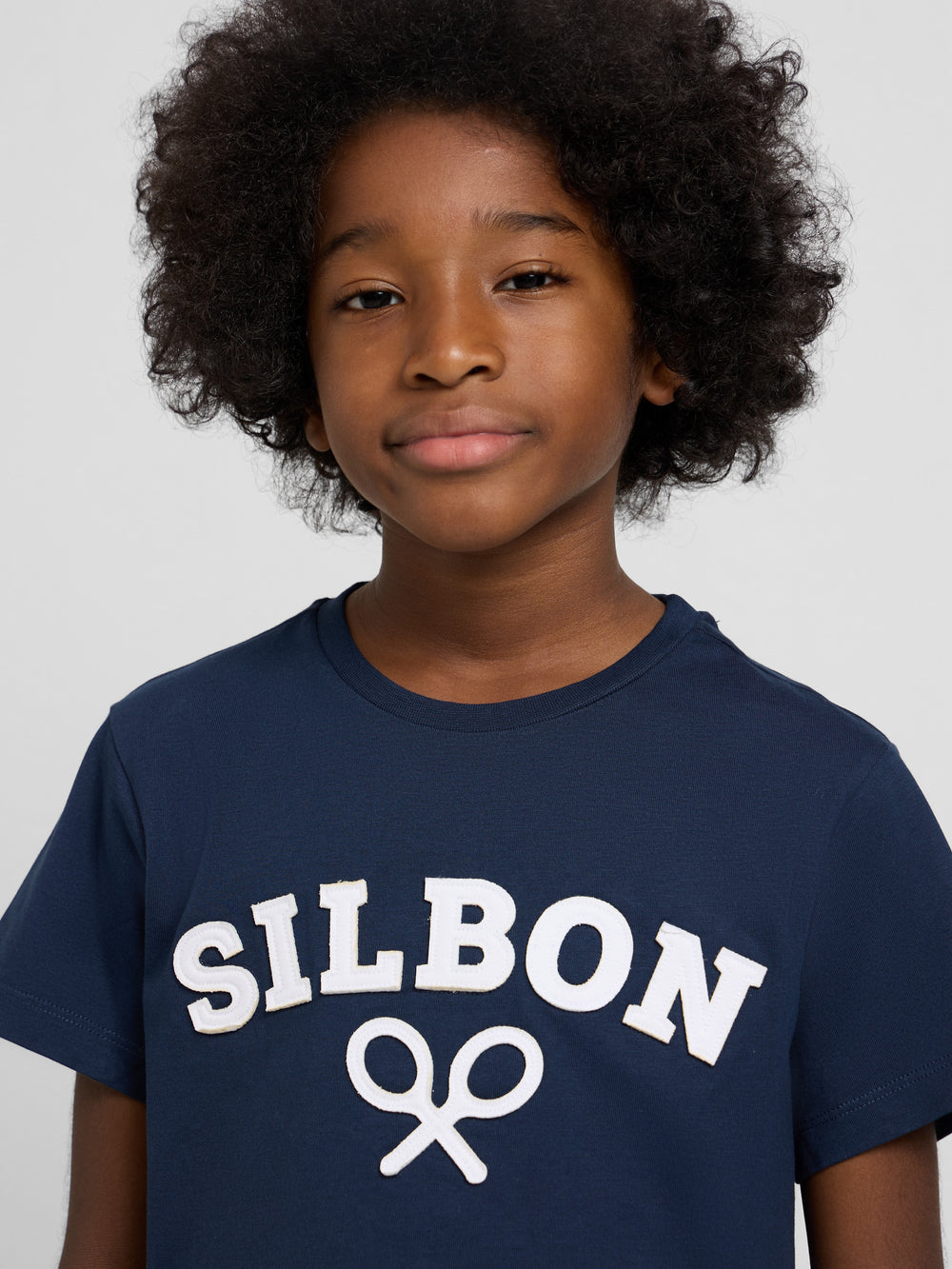 Camiseta kids raqueta media azul marino