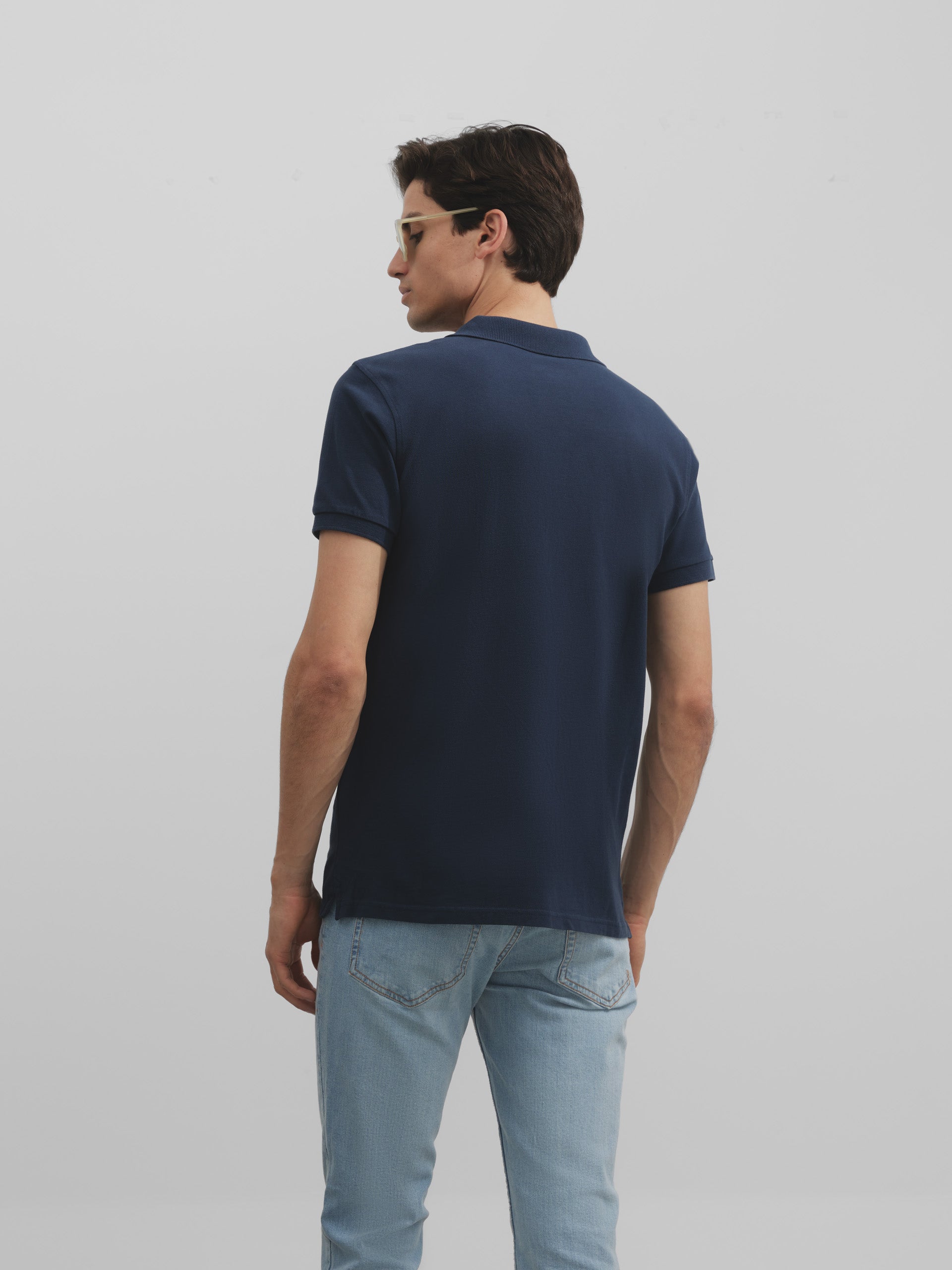 Medium navy blue plain logo polo shirt