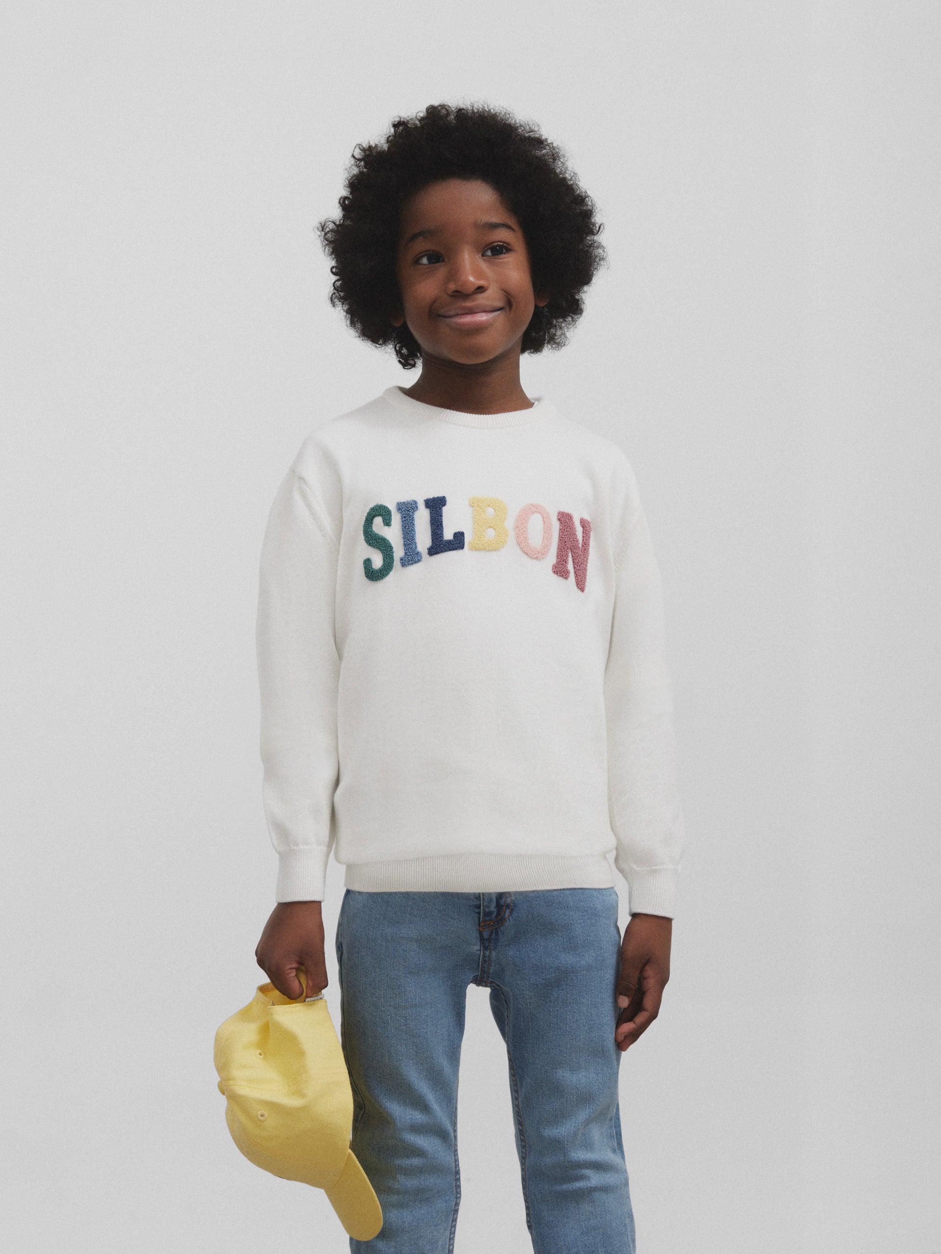 Kids sweater cream colored letters