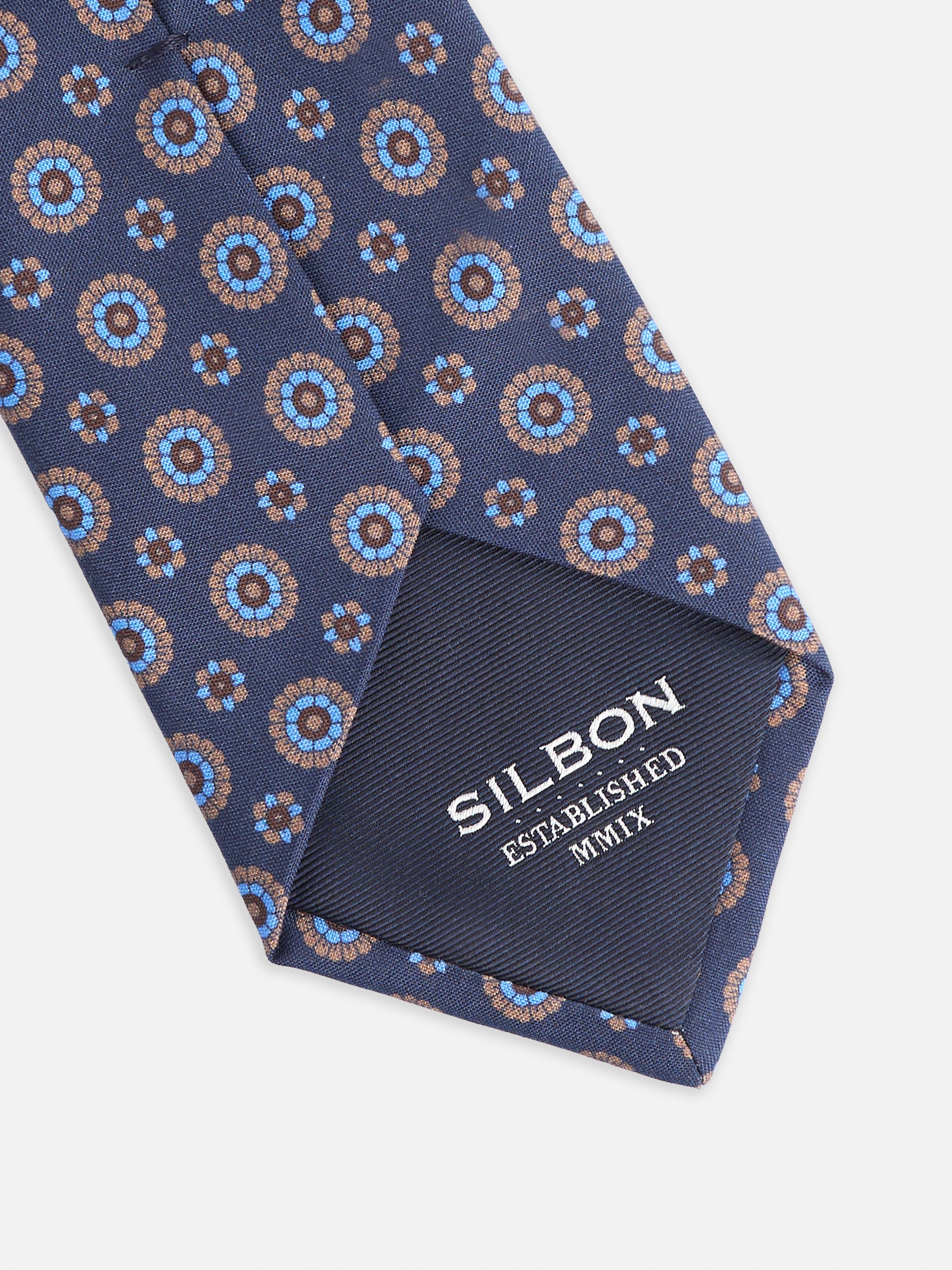 Corbata motivo floral azul marino