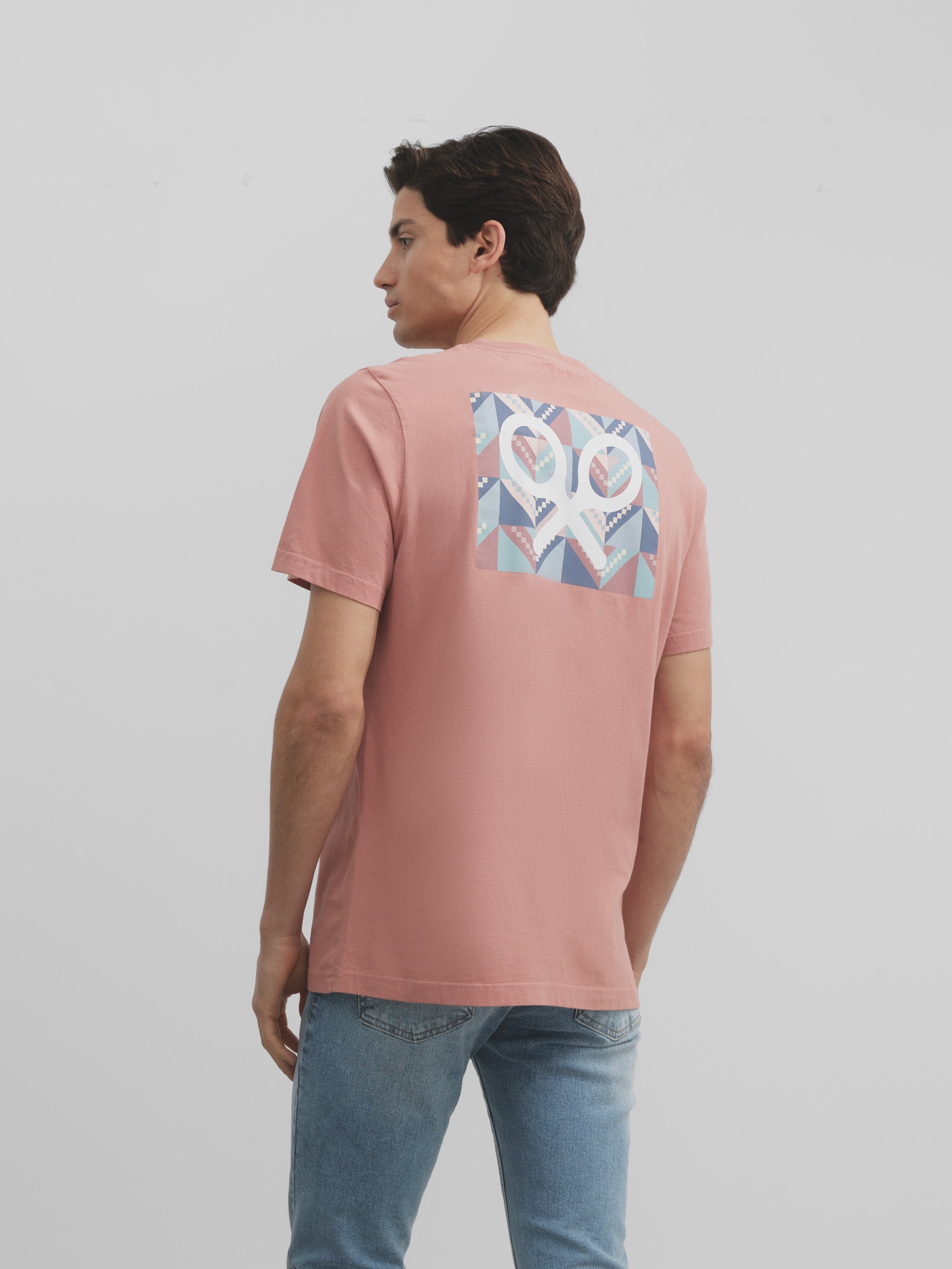 Coral geometric racket t-shirt