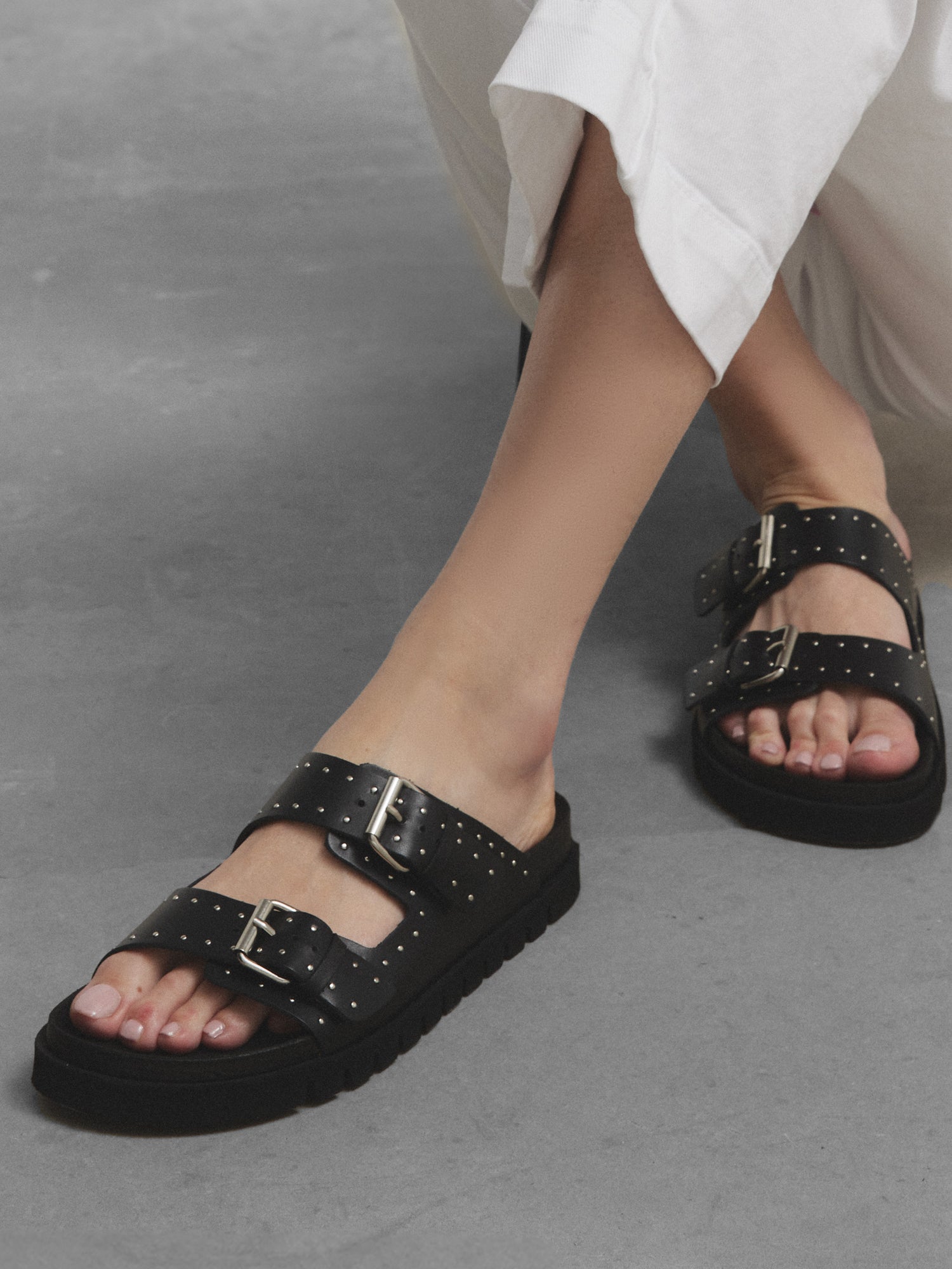 Black leather buckle sandals