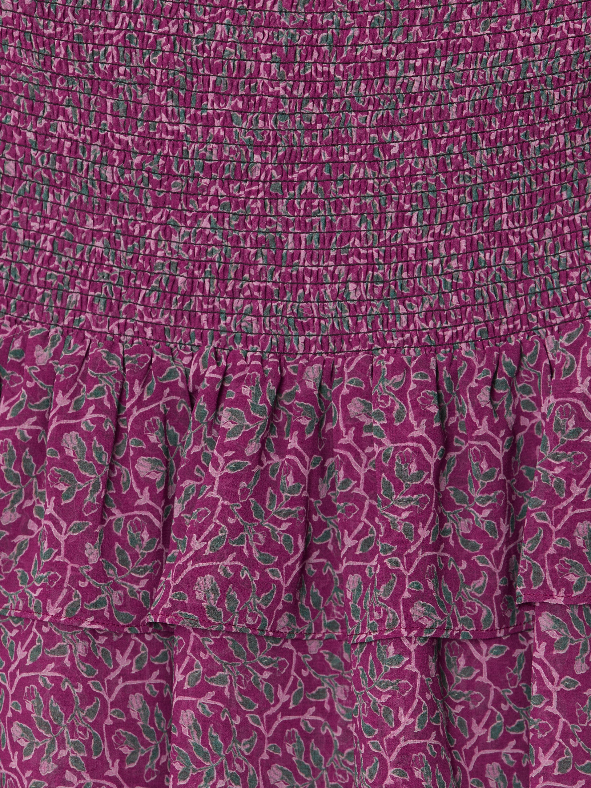 Mini-jupe froncée à imprimé roses