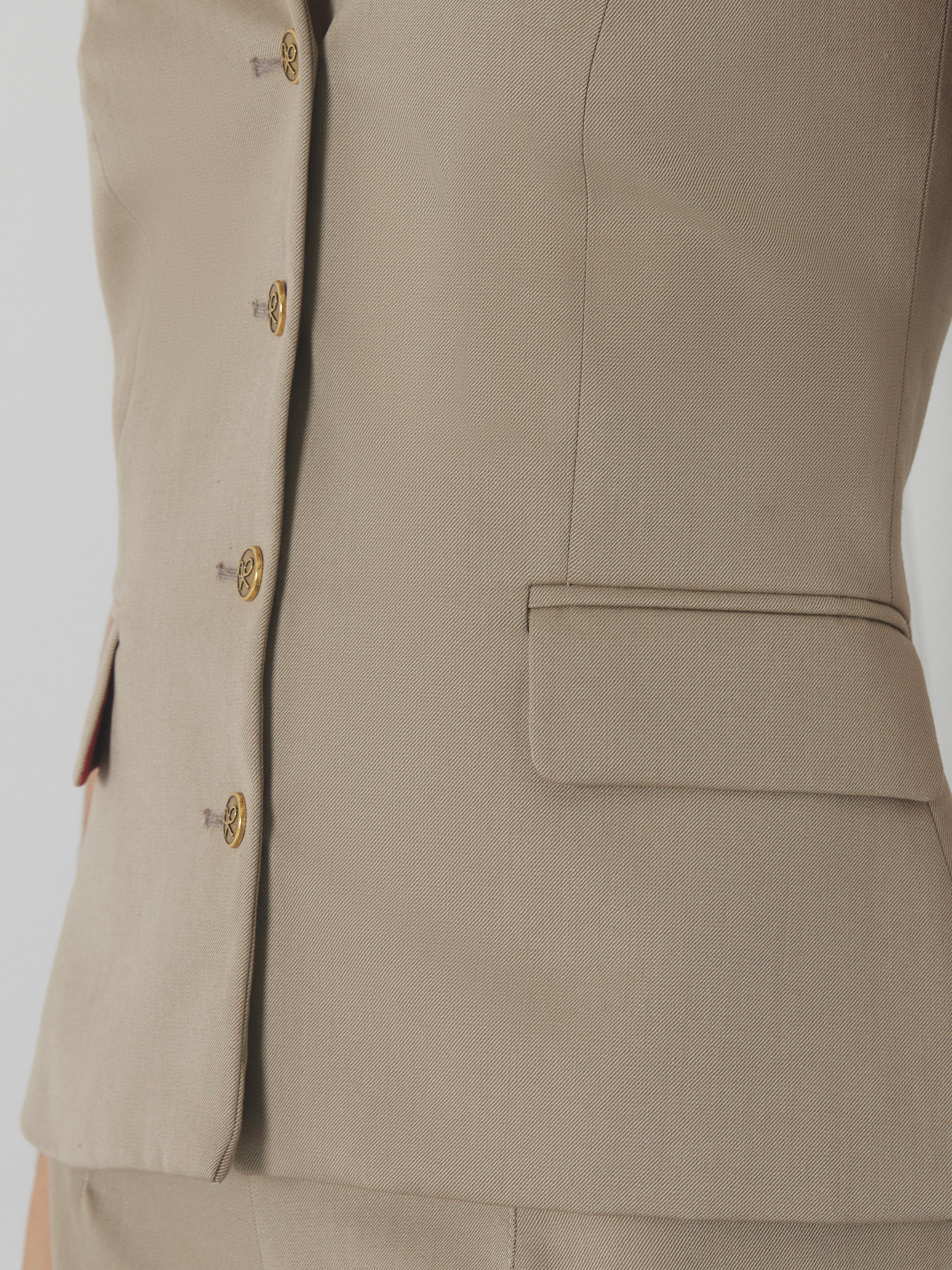 Unique woman vest with beige buttons