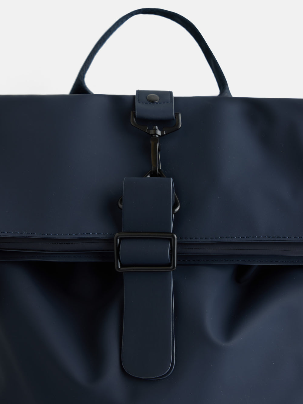 Navy blue rolltop backpack