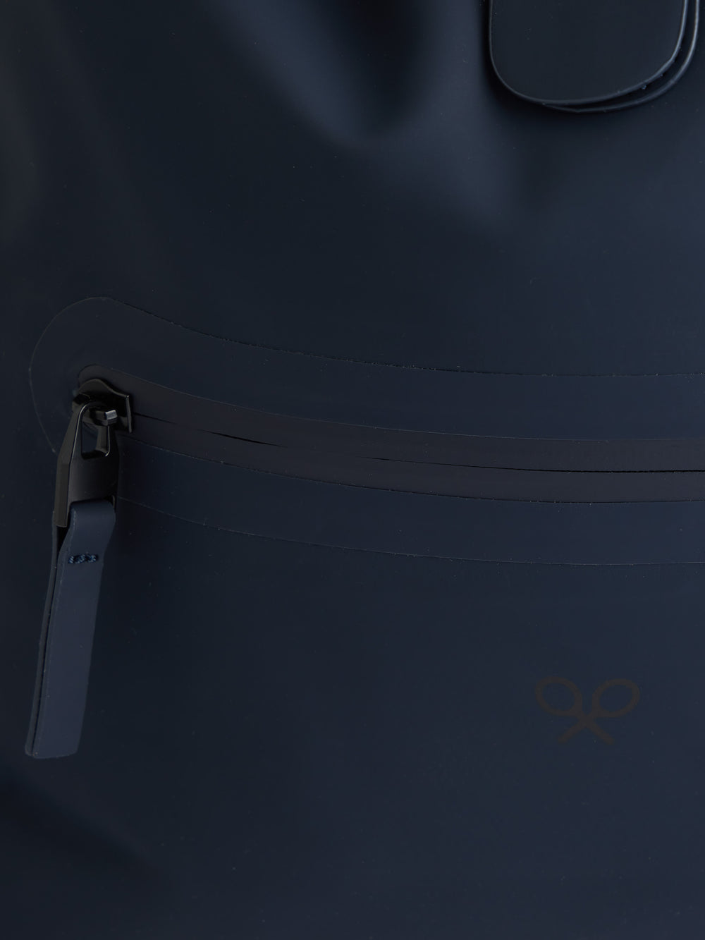 Navy blue rolltop backpack