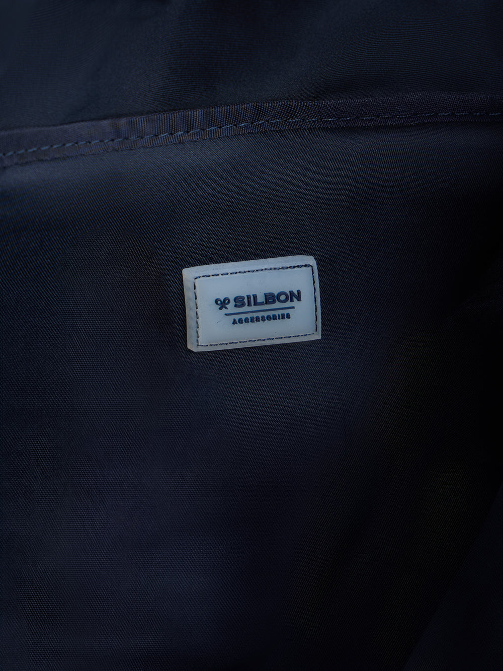 Navy blue rolltop backpack