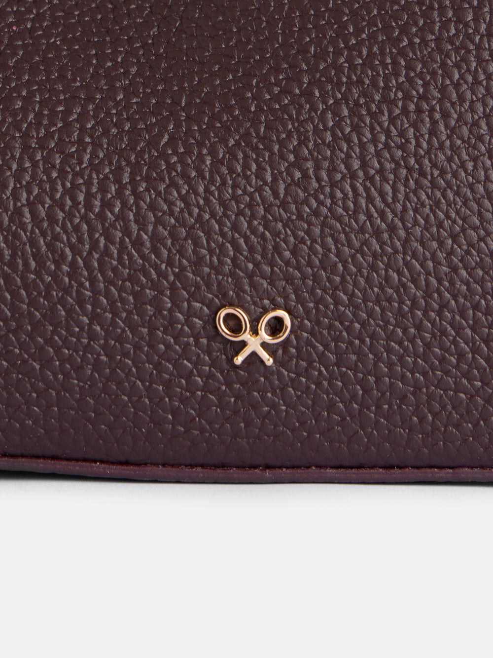 Bolsa pochette em pele bordô