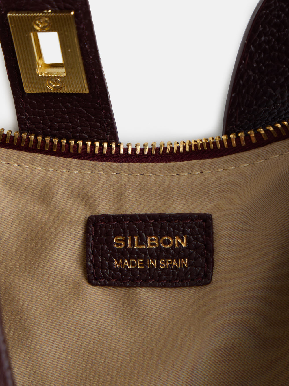 Bolsa pochette em pele bordô