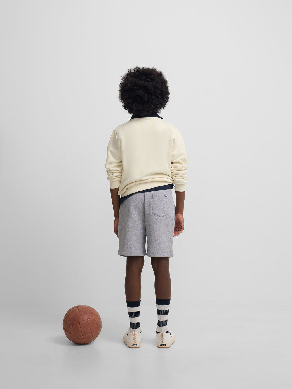 Bermuda deportiva kids gris