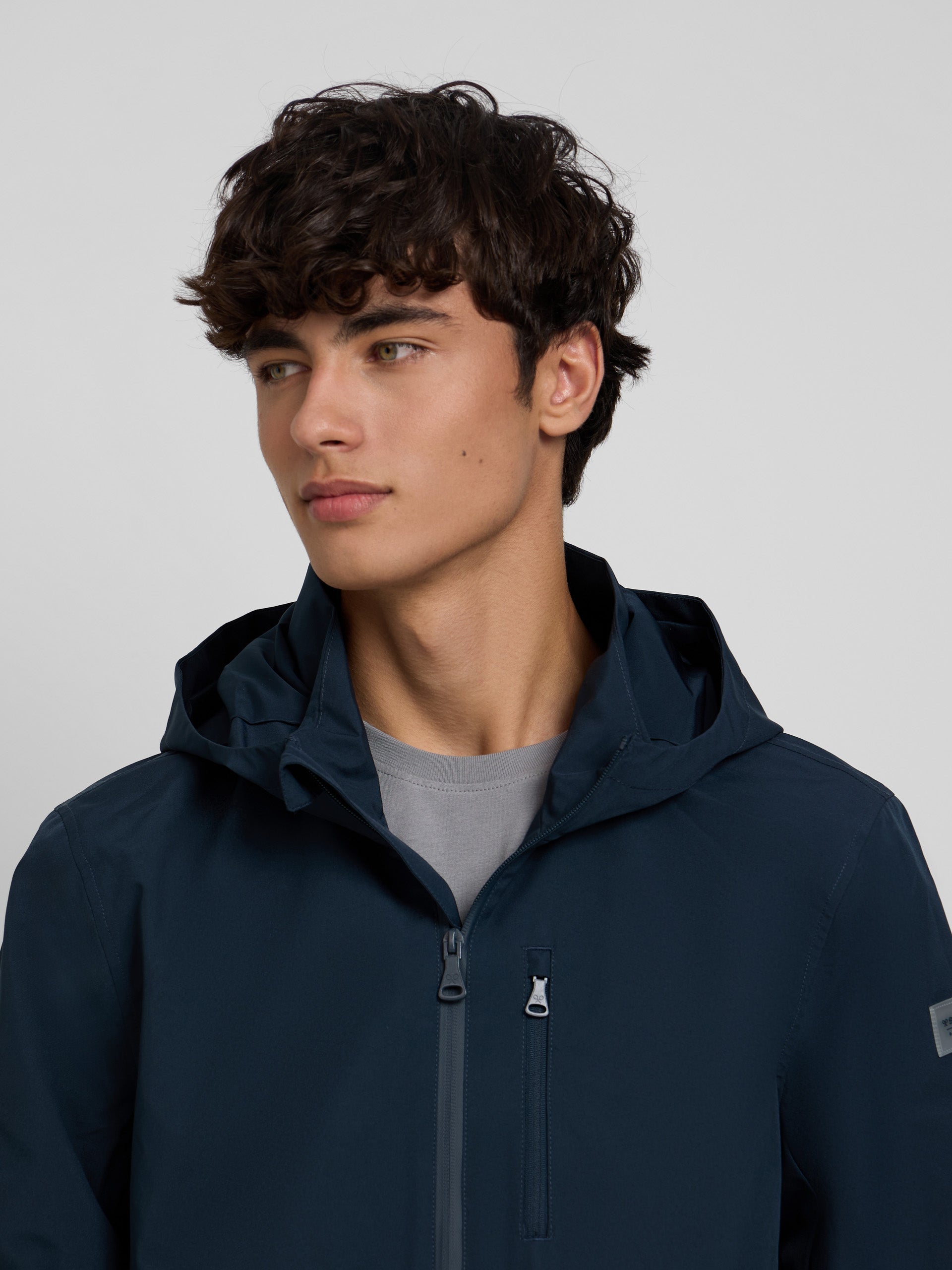 Chaqueta capucha cortavientos marino