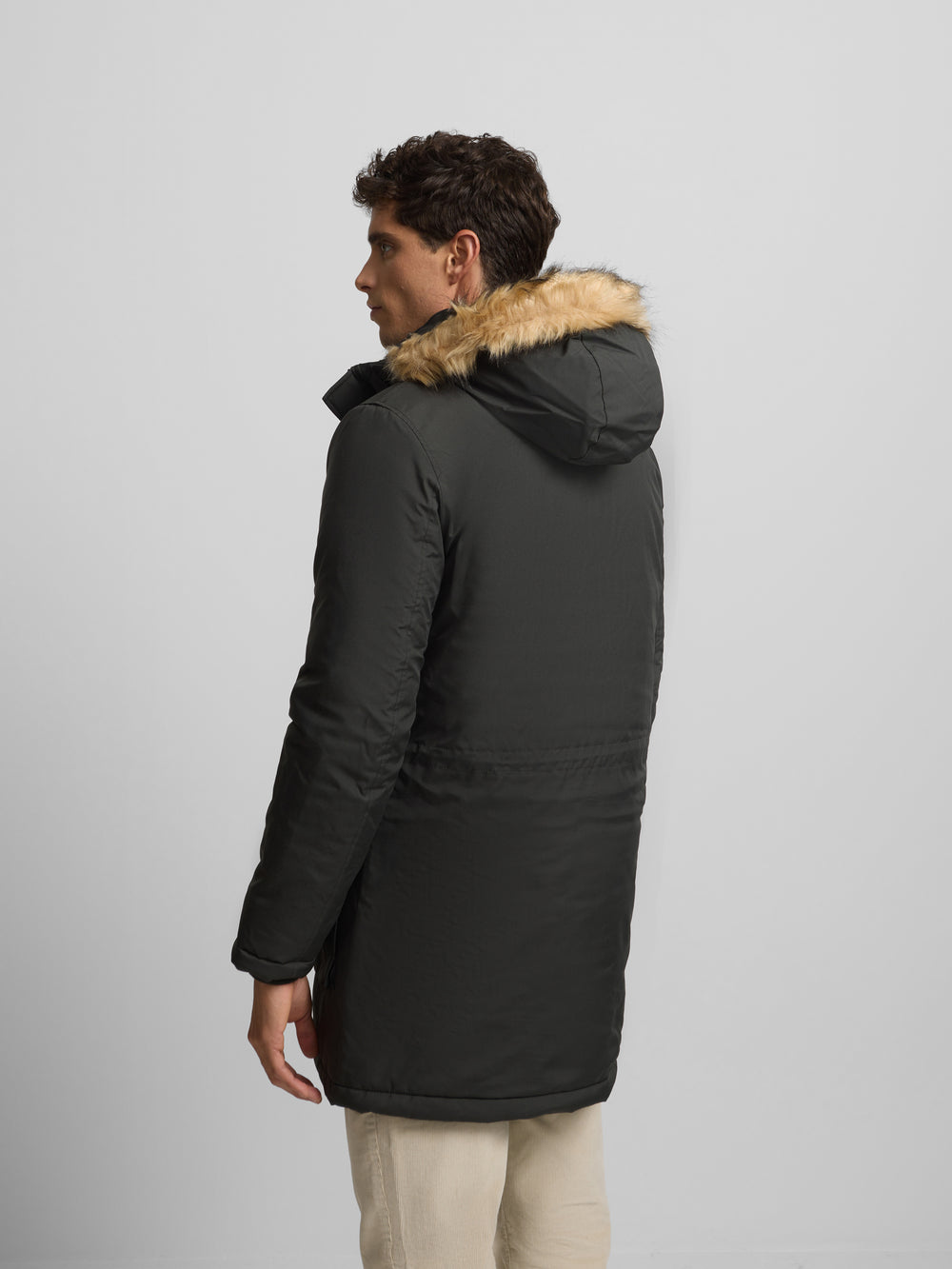 Long technical coat with green hood