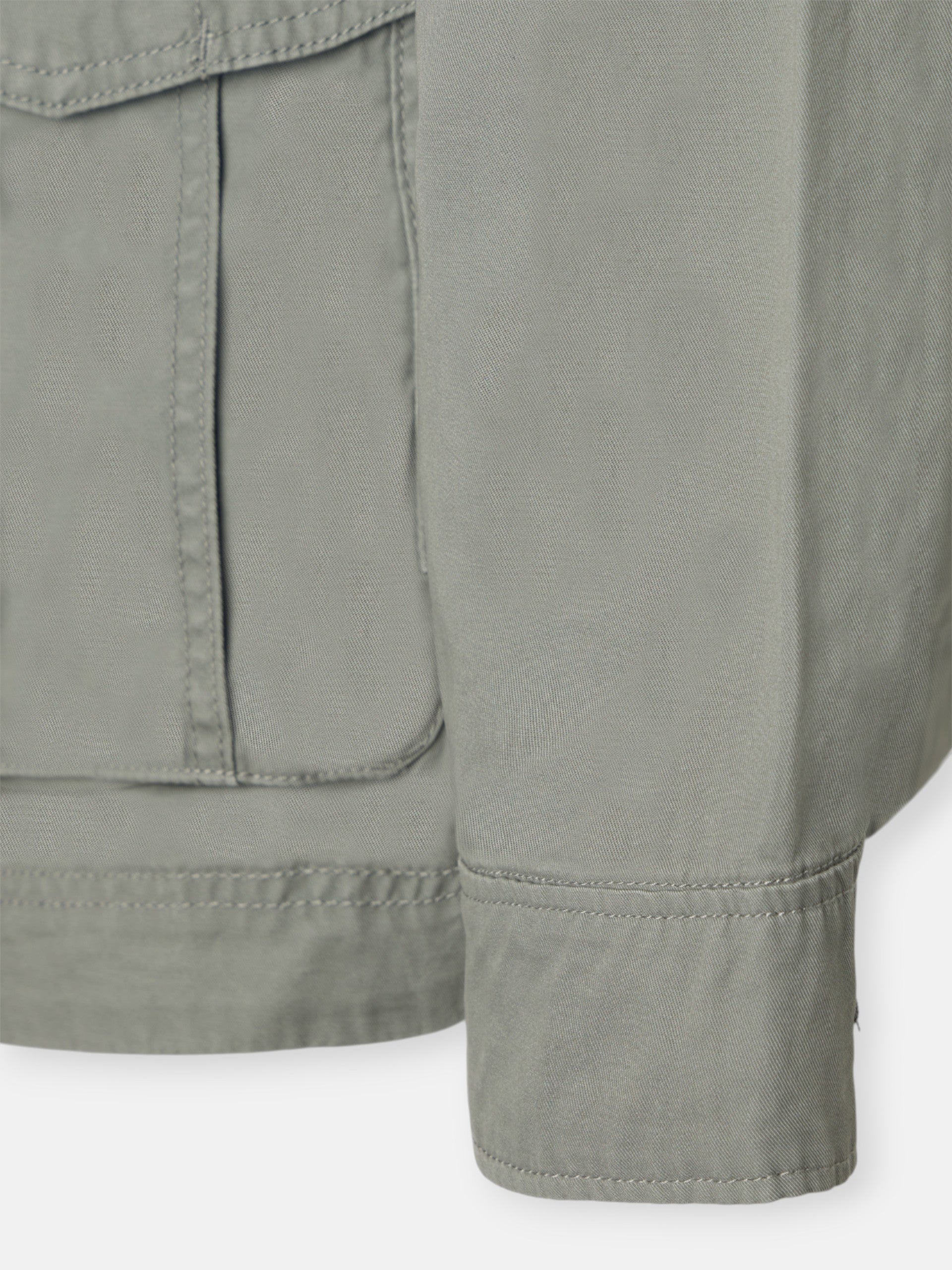 Military jacket with green dye patches