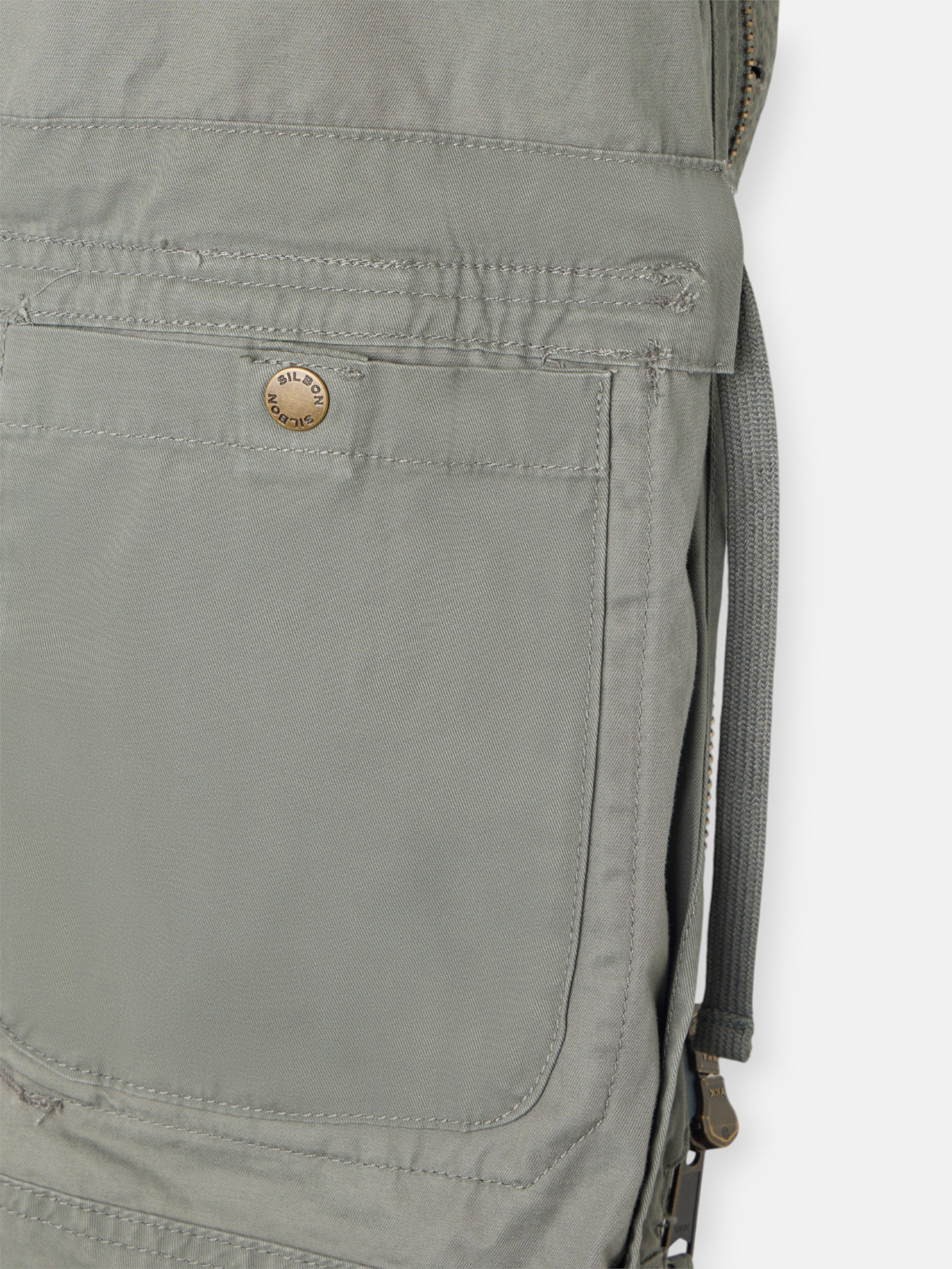 Military jacket with green dye patches