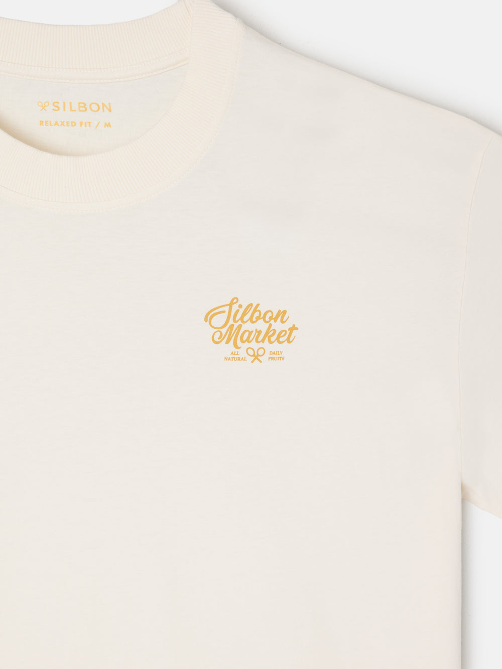 Camiseta relaxed fit market crema