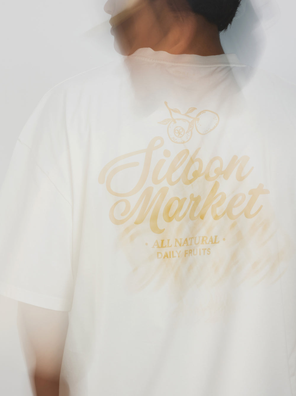 Camiseta relaxed fit market crema