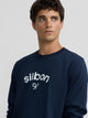 Navy blue long-sleeved T-shirt with medium logo