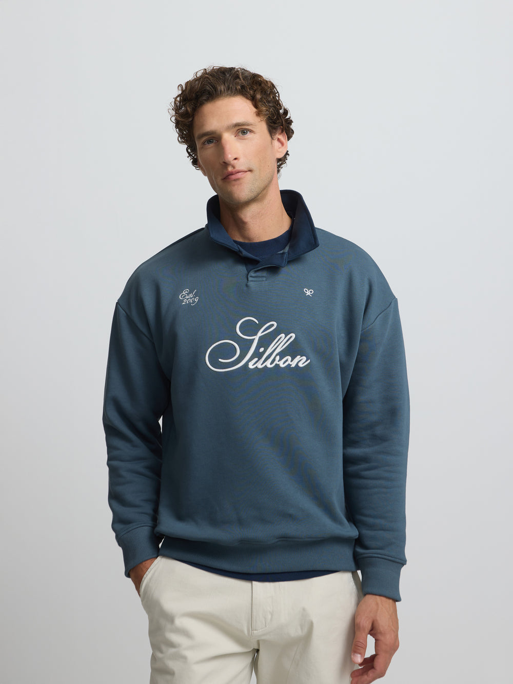 Sudadera polo contraste azul verde