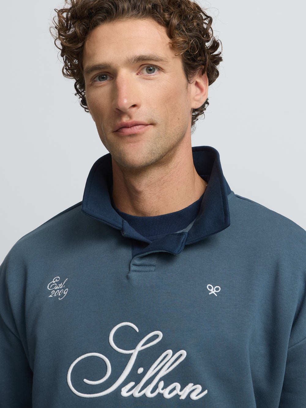 Sudadera polo contraste azul verde