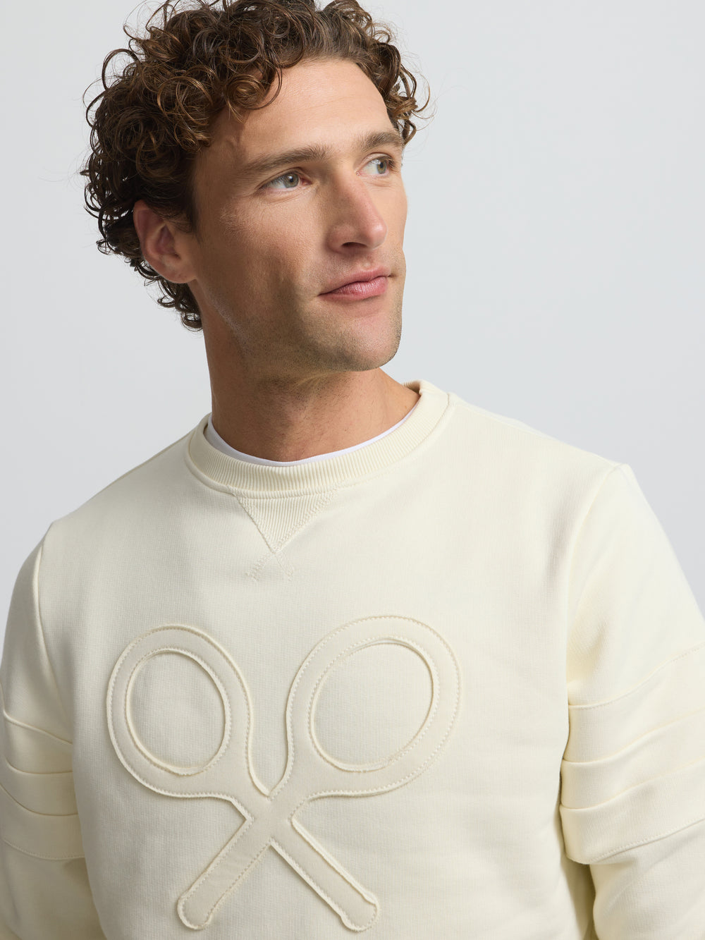 Sudadera raqueta relieve tono crema