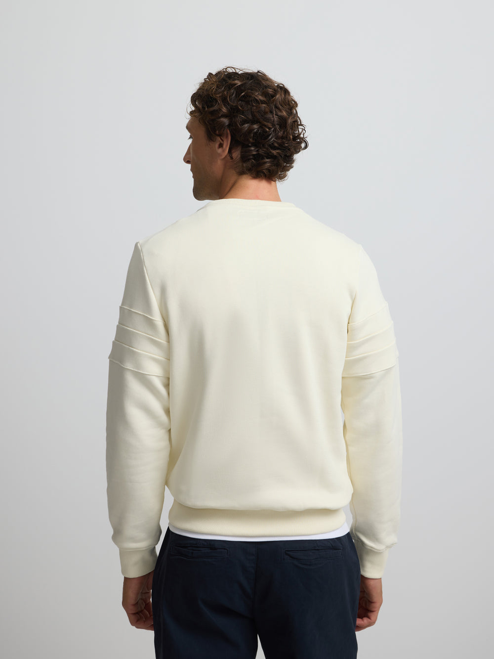 Sudadera raqueta relieve tono crema