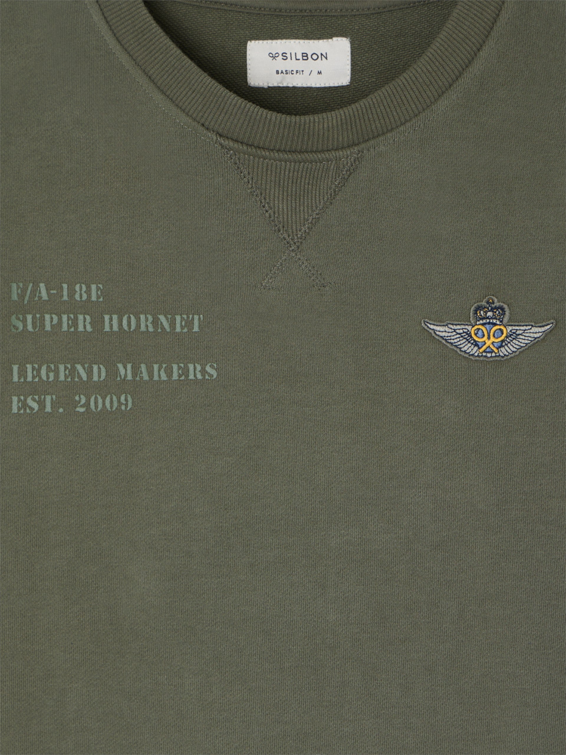 Sweat-shirt vert à écusson militaire